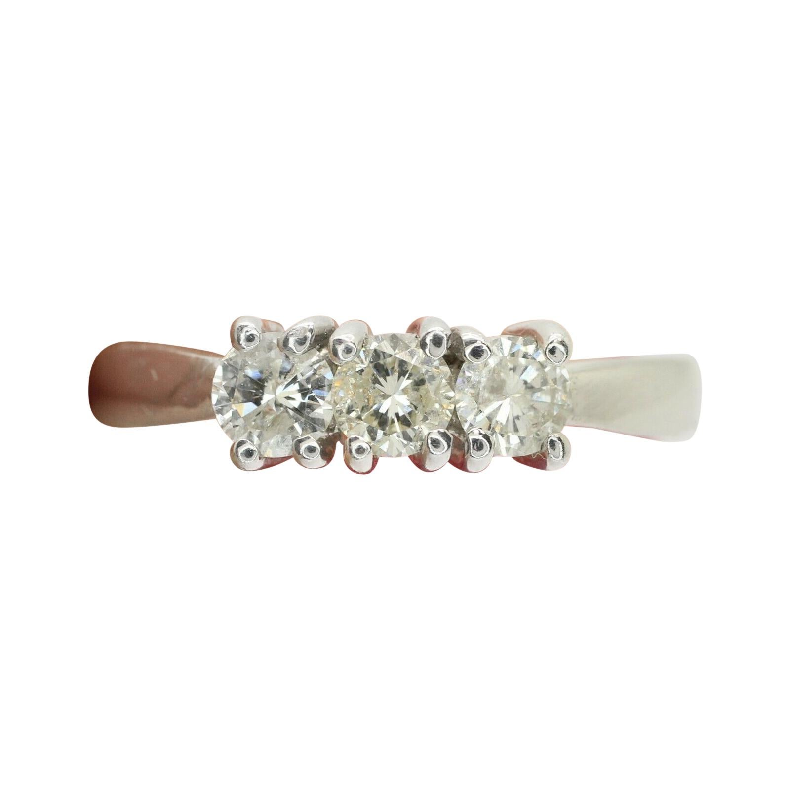 This Beautiful 14k Solid Gold 3 Stone Ring Decorated with Natural Diamonds