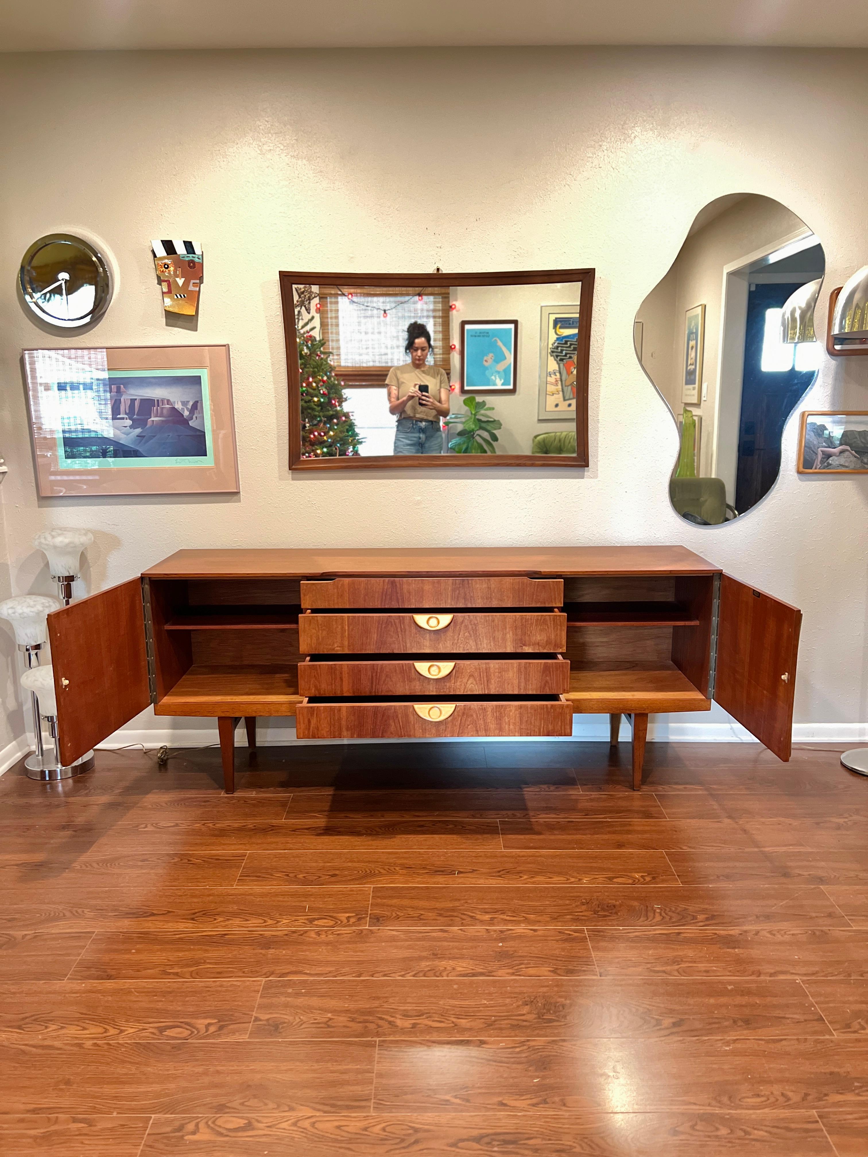 This beautiful mid century modern sideboard by Beautility, circa 1960s 2