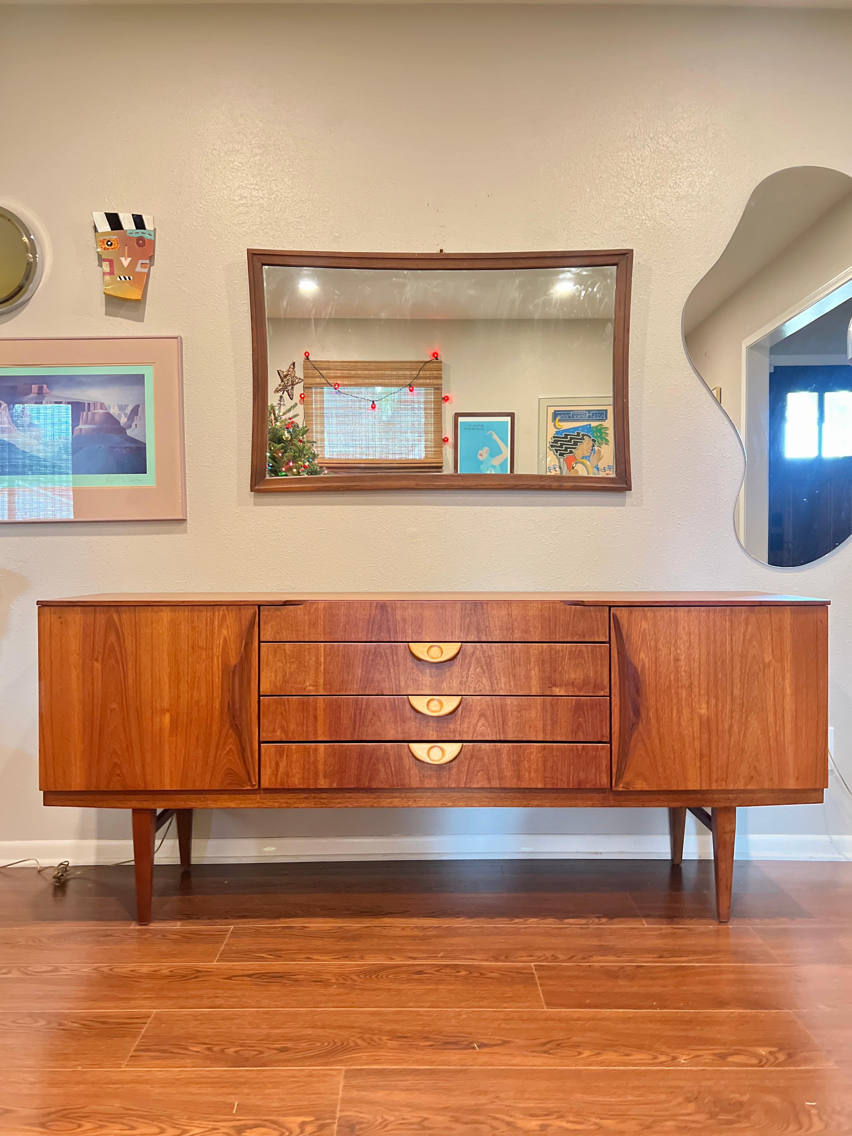 This beautiful mid century modern sideboard by Beautility, circa 1960s In Good Condition In Houston, TX