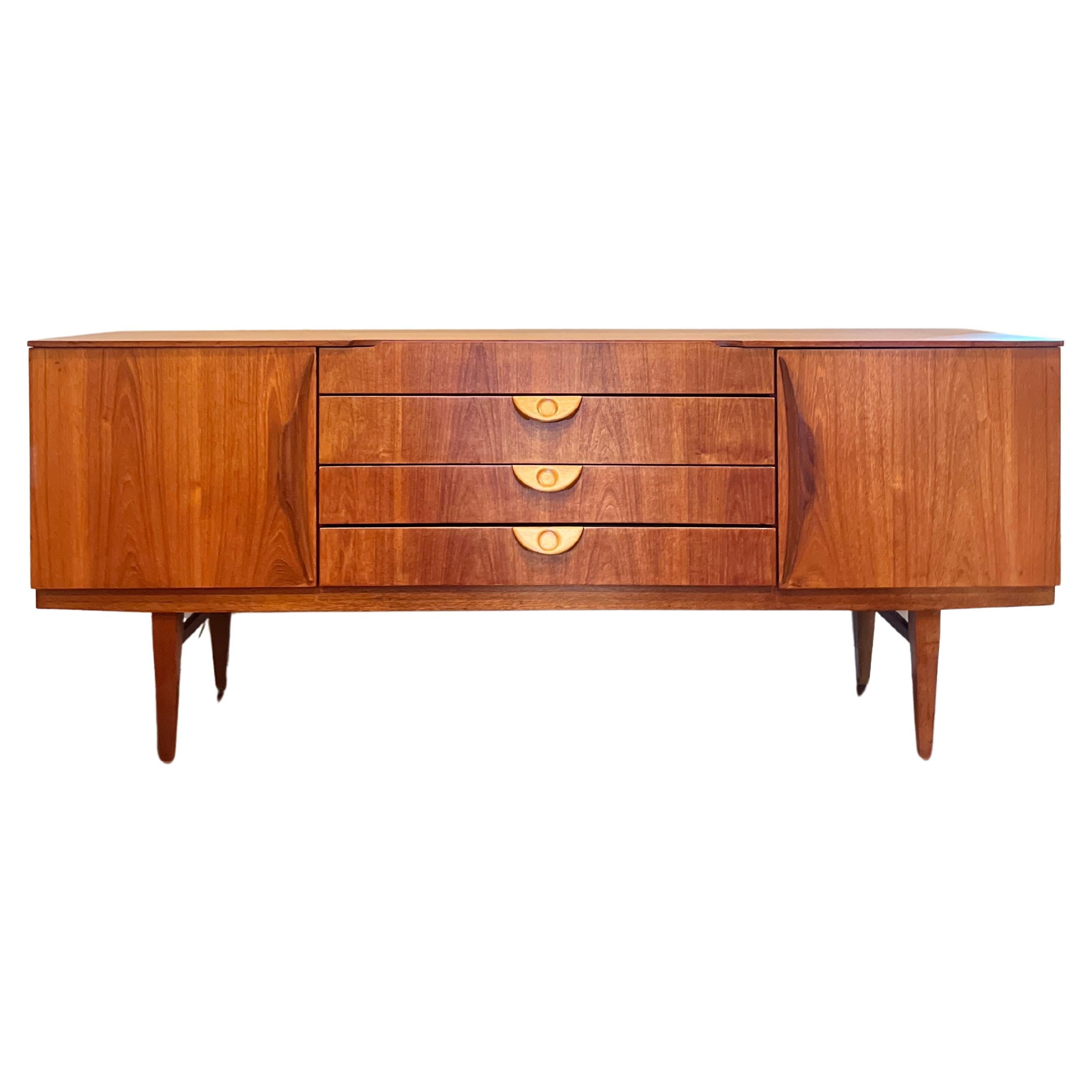 This beautiful mid century modern sideboard by Beautility, circa 1960s
