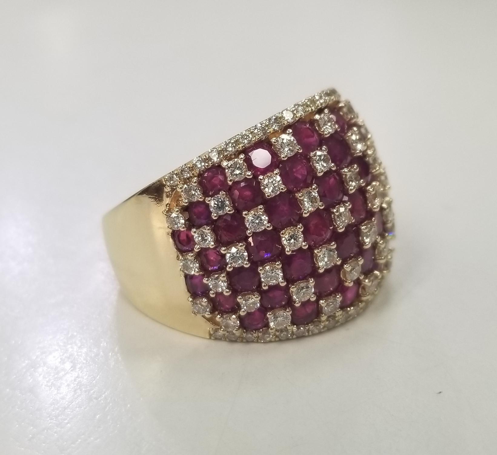 This beautiful Vintage 14k yellow gold Ruby and Diamond Checkerboard Ring, containing 
Specifications:
    main stone:  49 Round Rubies 2.75CTS.
    addition; 94 round diamonds 1.25cts.
    brand: CUSTOM 
    metal: YELLOW GOLD
    type: ring
   