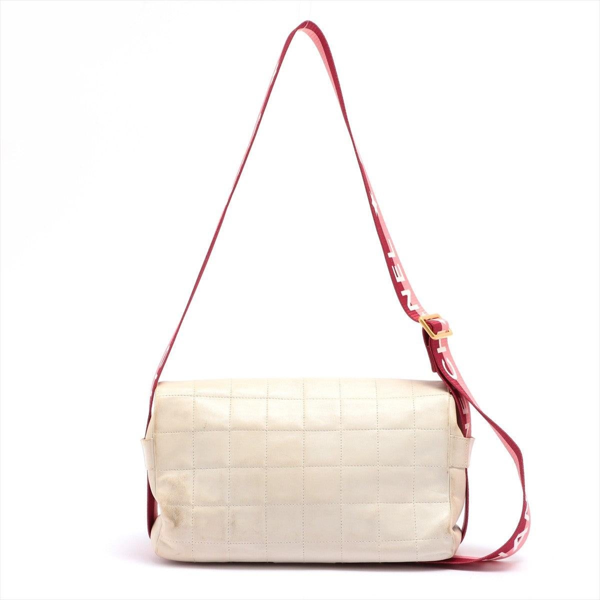 This Chanel shoulder bag is crafted in white lambskin leather with stylistic square Chocolate Bar quilting, featuring red 'CC' logo print on front flap and finished with red and pink striped canvas trim and an adjustable shoulder strap. This bag