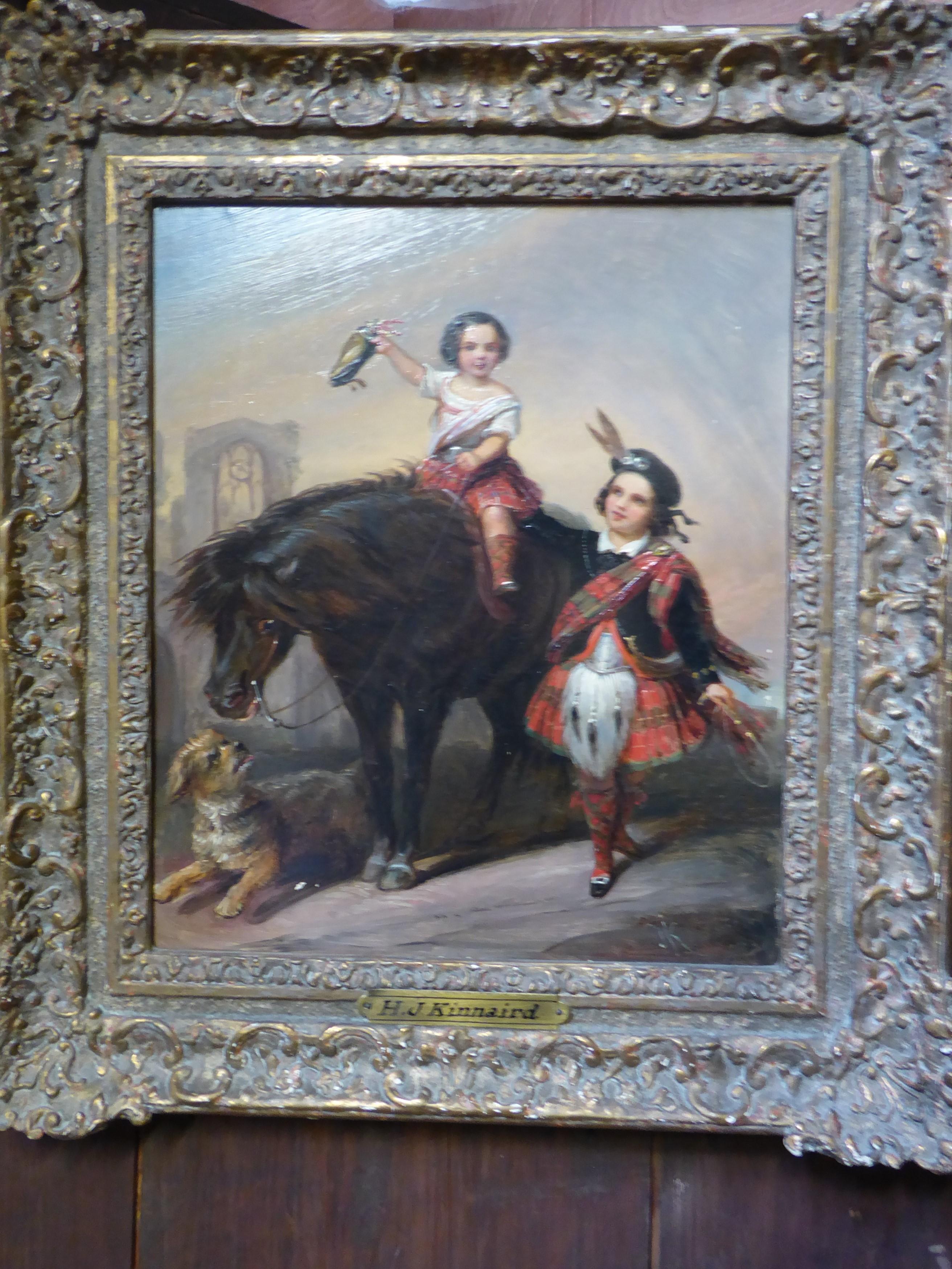 This charming oil on board painting, depicting two youths in full highland dress, one seated upon a pony, gleefully waving their bonnet, with a terrier in the foreground by Hj Kinnaird.