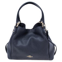 This Edie satchel by Coach is an ideal option for keeping your daily essentials 