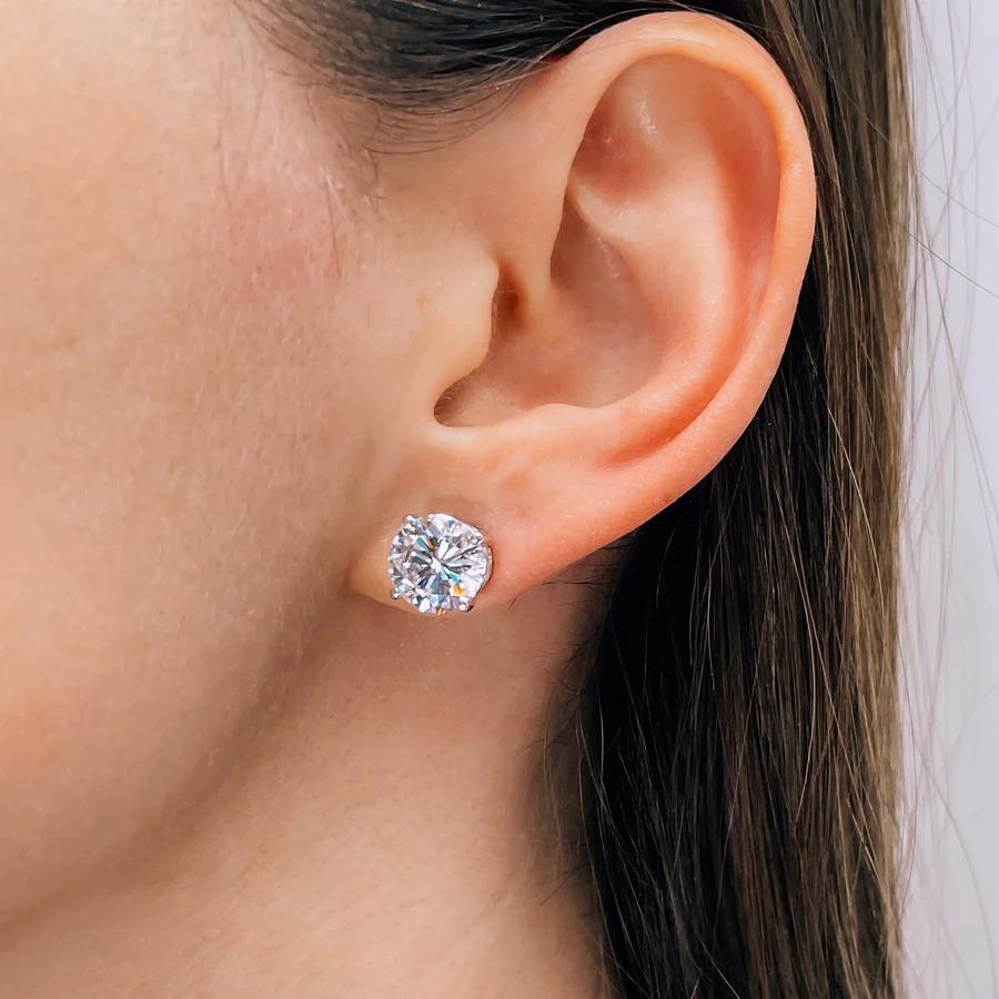 This gorgeous 6.17ctw pair of round brilliant cut natural diamonds offer fantastic size and a lively play of light! They are 100% natural earth mined diamonds and have not received any treatments or enhancements of any kind. Graded H for color, the