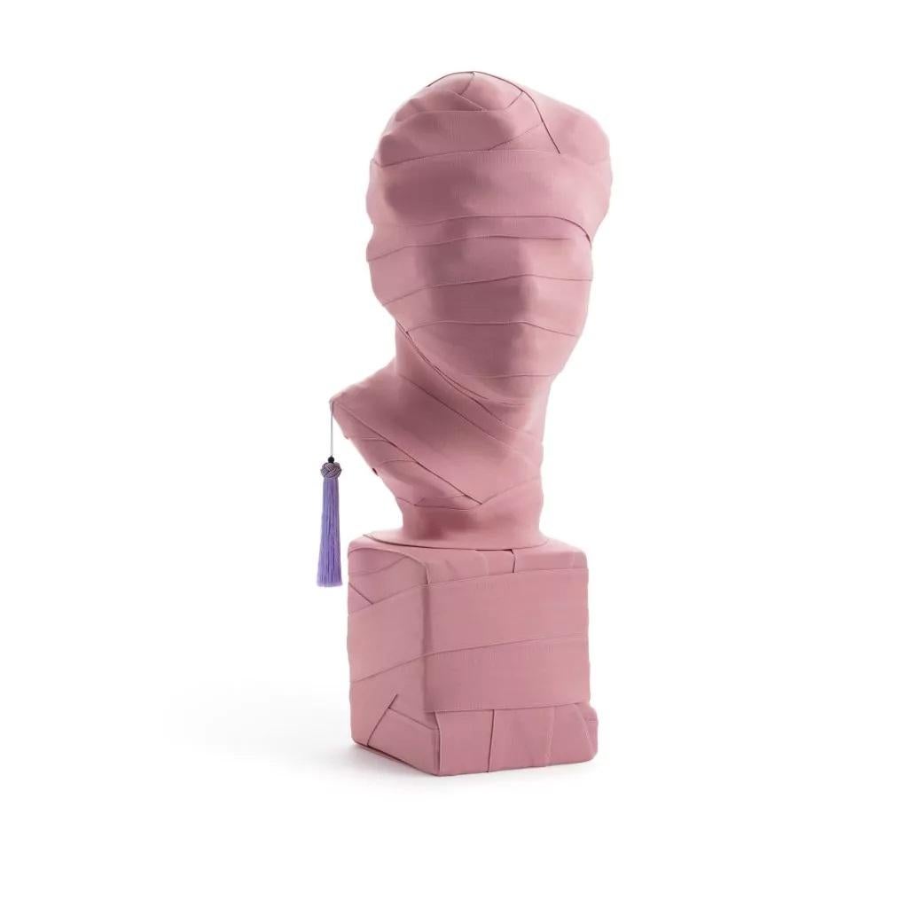 This is not a self portrait sculpture by Thomas Dariel
Dimensions: D 24 x W 26.5 x H 63 cm 
Materials: Solid plaster sculpture wrapped in elastic band color paint finish, accent ribbon.
Also available in colors: Orange, Green and Violet.


In