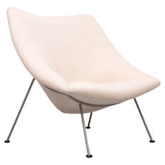 This is the iconic Artifort Oyster armchair by designer Pierre Paulin