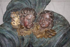 Italian Carved Mirror with Putti and Swirling Cloud Motifs