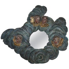 Italian Carved Mirror with Putti and Swirling Cloud Motifs 