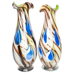 This unique pair of authentic Murano art glass vases