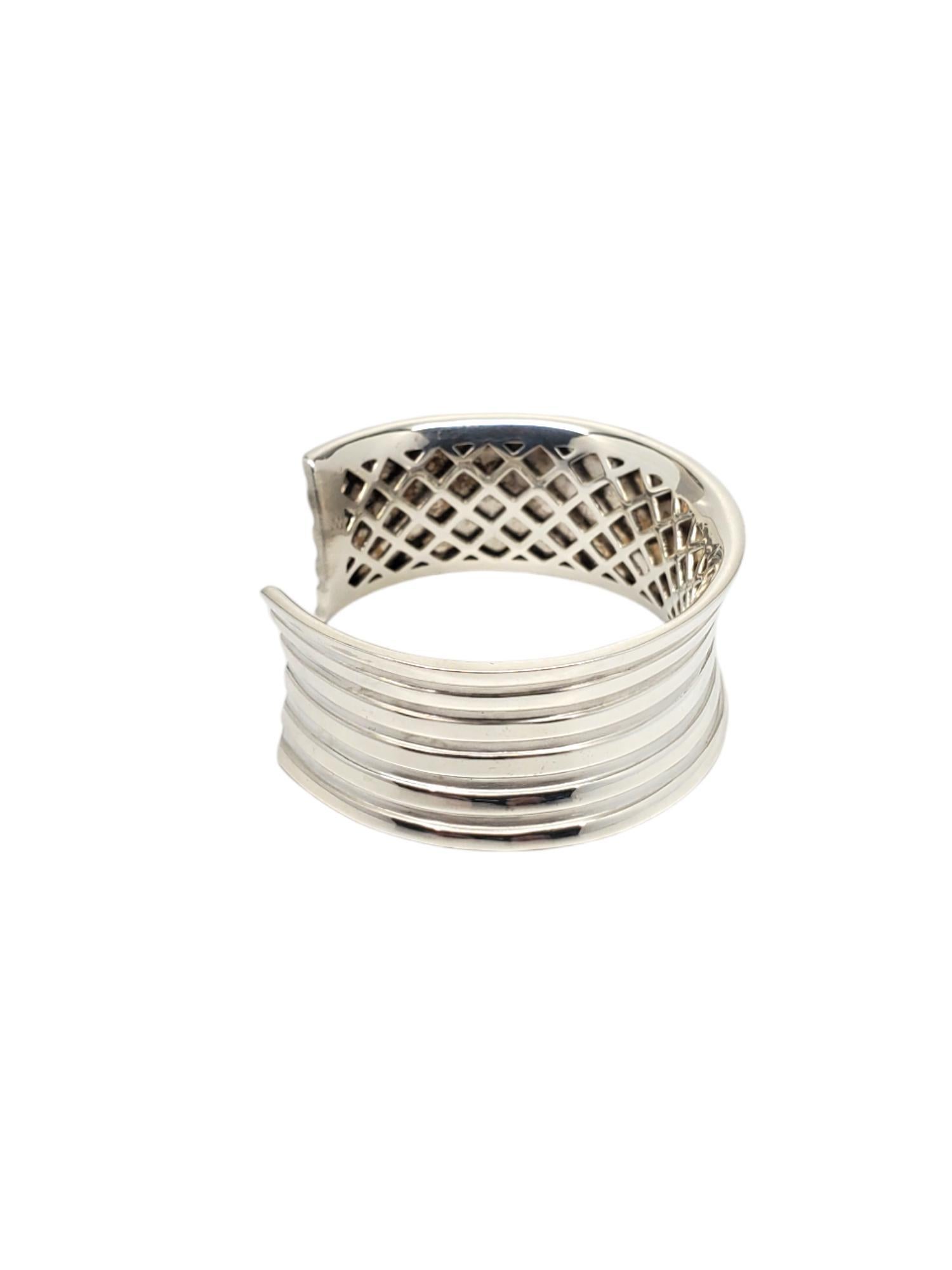 Thistle & Bee Sterling Silver Wide Cuff Bracelet-

This stunning cuff bracelet by Thistle & Bee features horizontal lines in polished & satin sterling silver.

Size: Fits up to 6