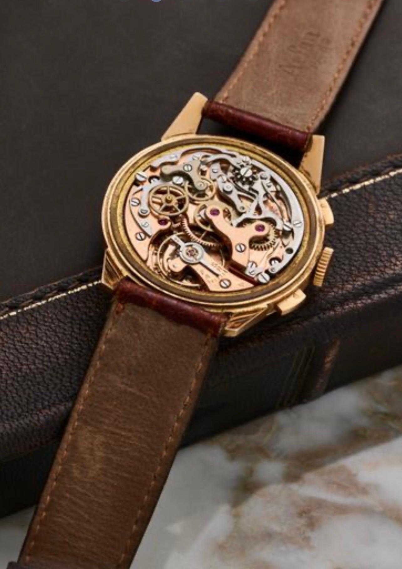 THISY Valjoux 22 circa 1950/55 Case: 18k rose gold (0/750°°). 
Pressure caseback. Dial: Two-tone silver, applied indexes alternating Arabic numerals and batons, red tachymeter scale, 30min counter. Dauphine hands. 
Movement: Mechanical Valjoux 22