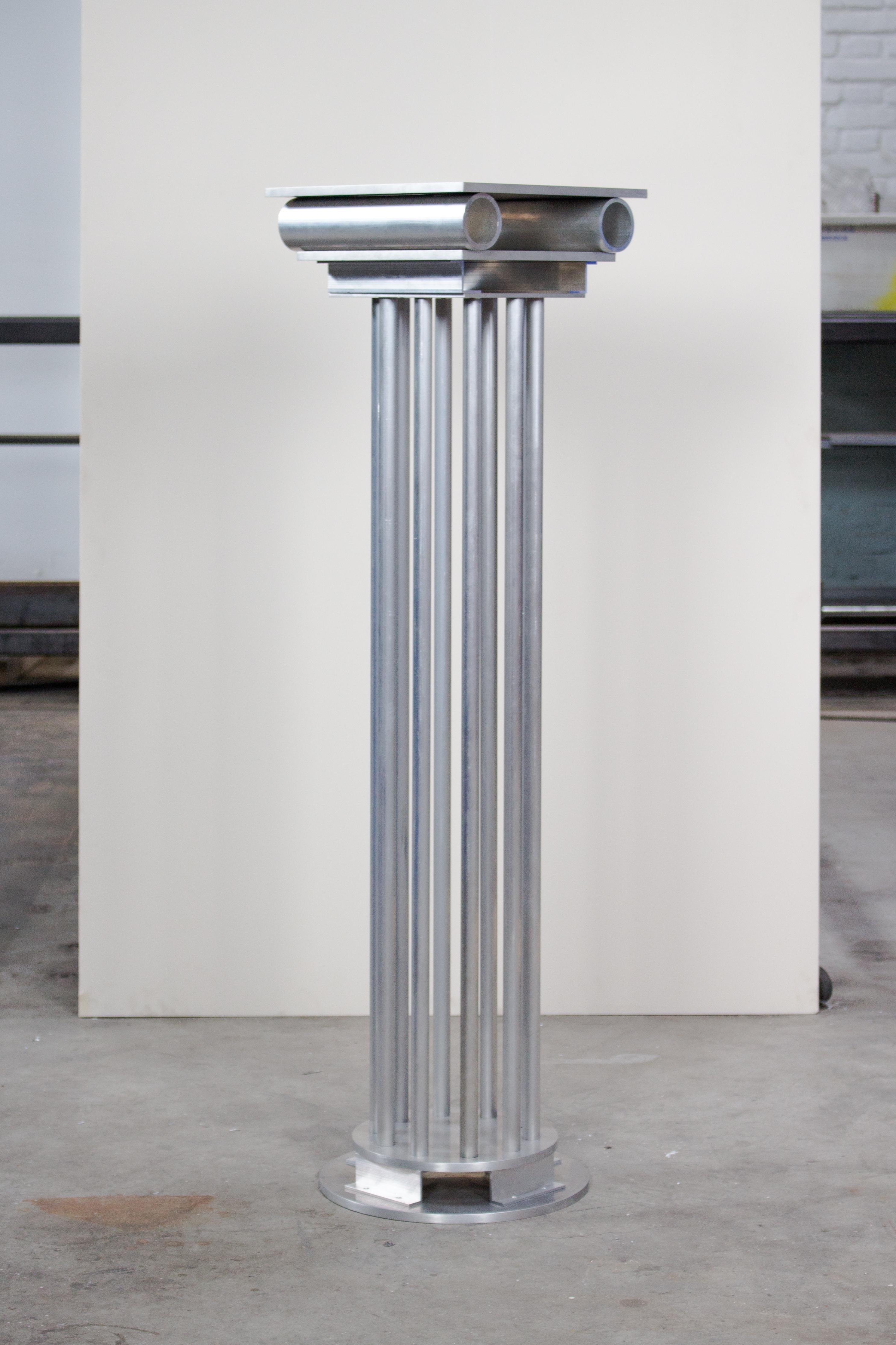 Metope column by Joachim-Morineau Studio
Dimensions: H 110 x D 30 x W 30 cm, 20 kg
Materials: Aluminium tubes, profiles, screws and sheets
Possibility to have a different colour/finish (such as blasted or anodized aluminium).

THOLOS, PTERON