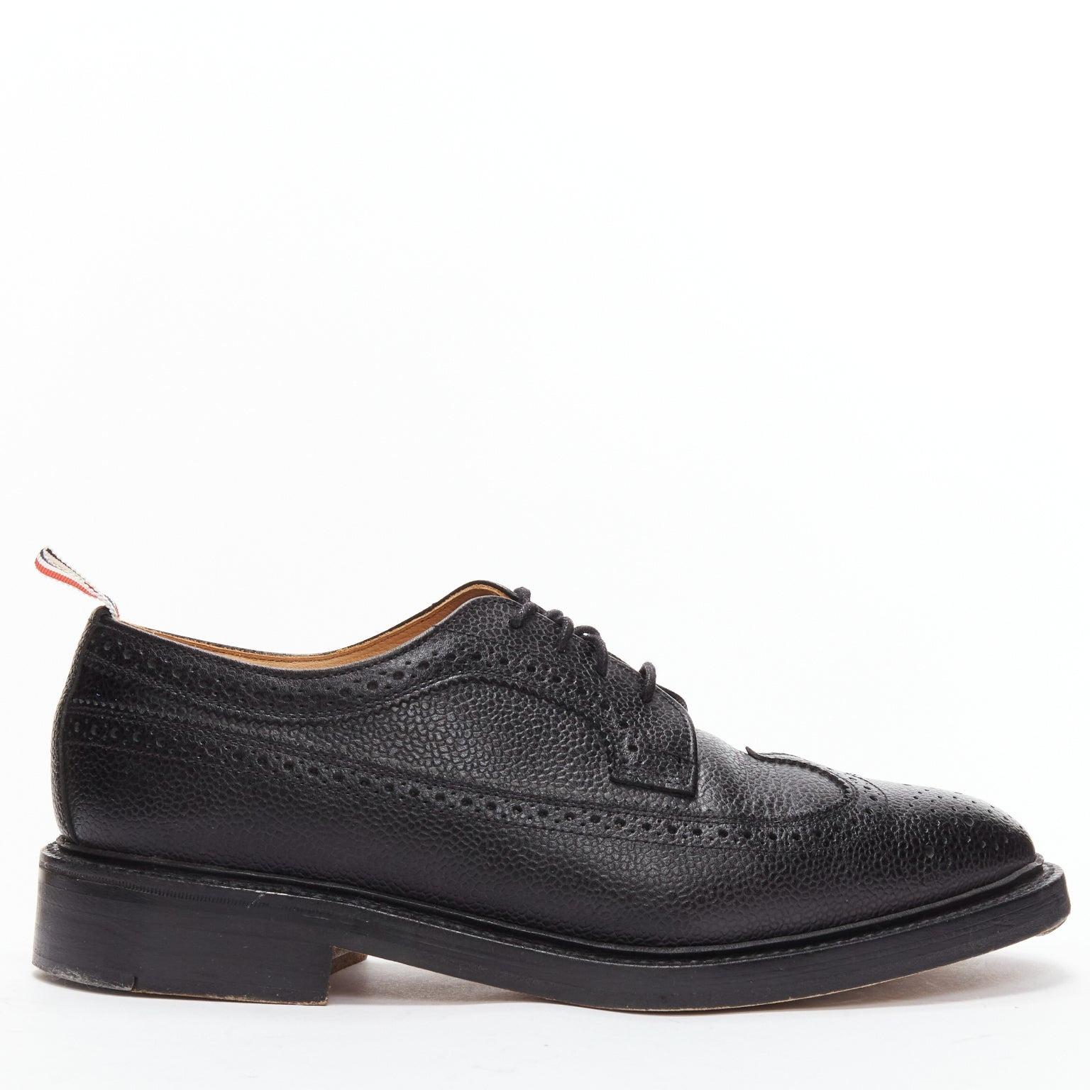 THOM BROWNE black grained leather perforated oxford brogue shoes EU42.5
Reference: JSLE/A00092
Brand: Thom Browne
Designer: Thom Browne
Material: Leather
Color: Black, Multicolour
Pattern: Striped
Closure: Lace Up
Lining: Nude Leather
Extra Details: