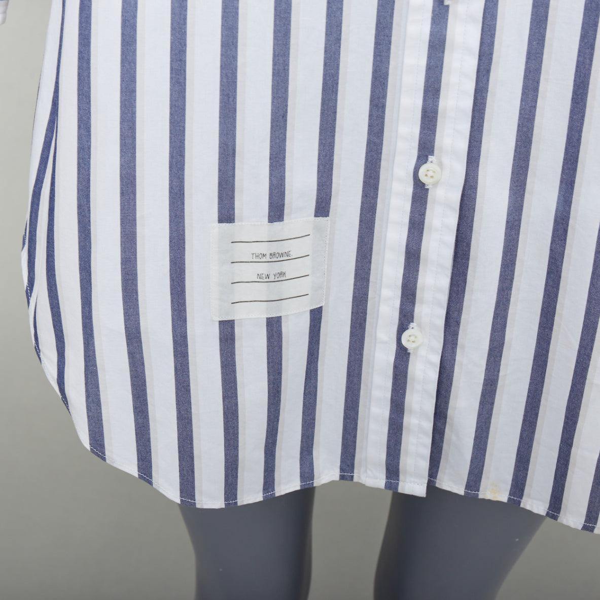 THOM BROWNE blue white poplin cotton stripe button down shirt dress US0 XS0
Reference: LNKO/A02513
Brand: Thom Browne
Designer: Thom Browne
Material: Cotton
Color: Blue, White
Pattern: Striped
Closure: Button
Extra Details: TB tab at hem.
Made in: