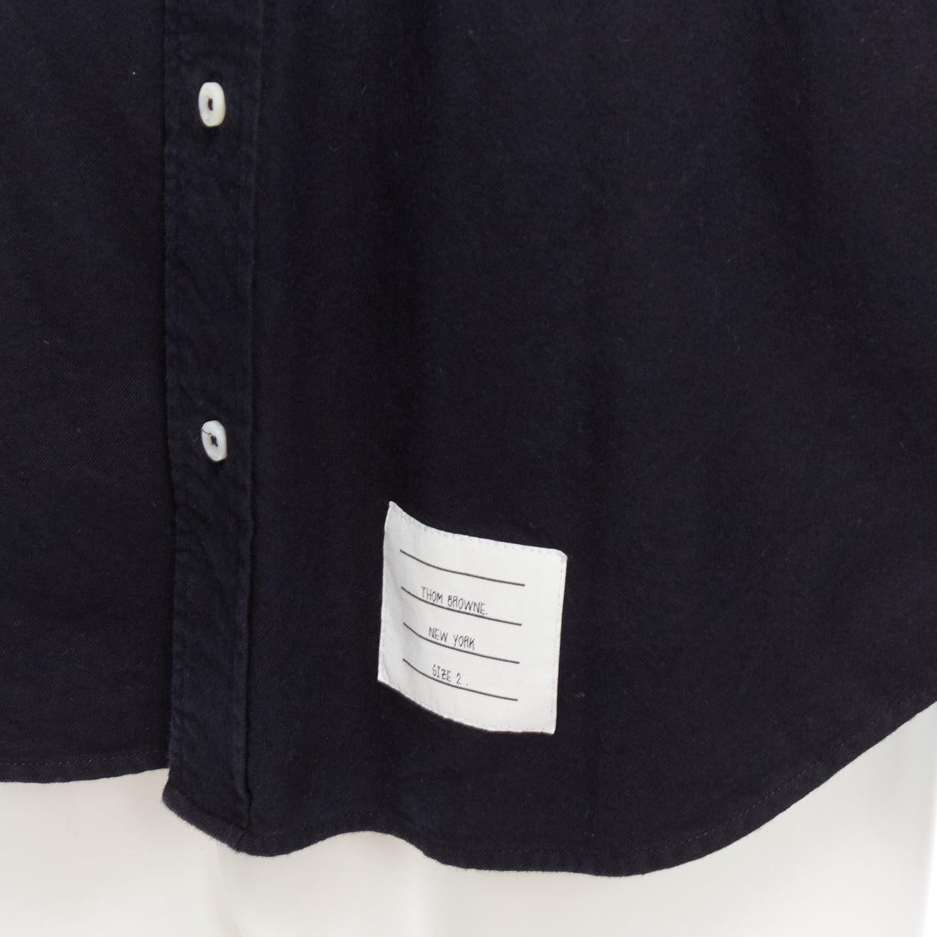 THOM BROWNE Four Bar black grey cotton classicTB tab shirt JP2 M
Reference: YIKK/A00020
Brand: Thom Browne
Designer: Thom Browne
Material: Cotton
Color: Grey, Black
Pattern: Striped
Closure: Button
Extra Details: TB tabs at front hem and back