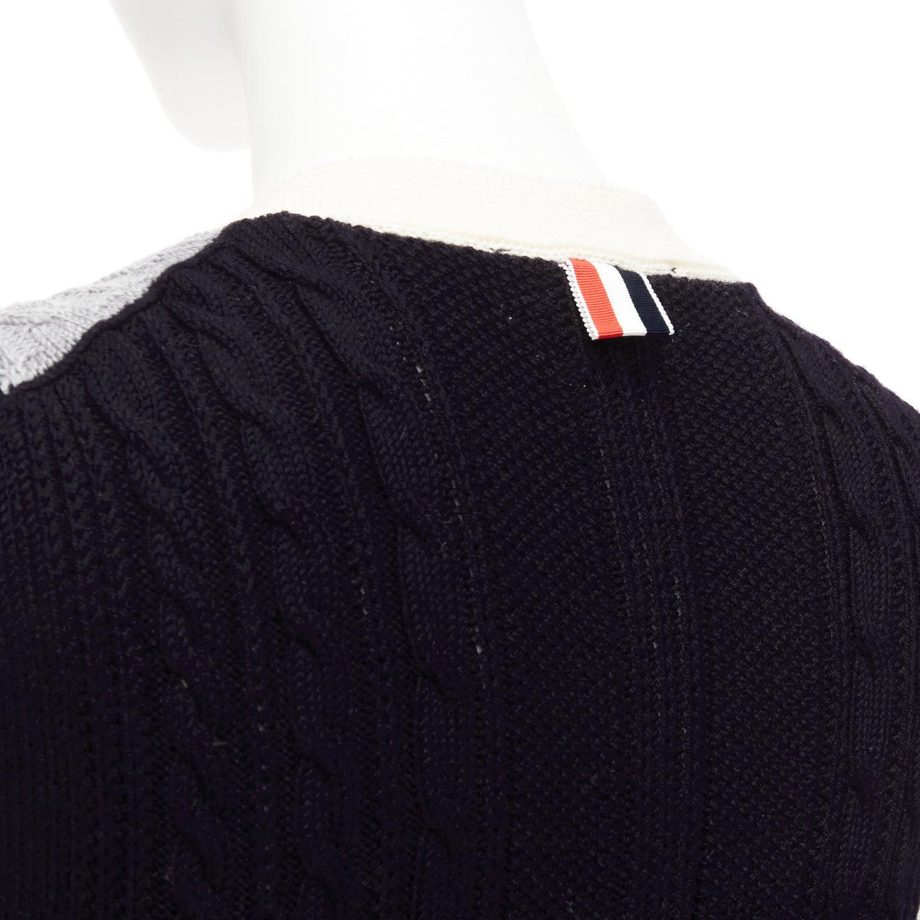 THOM BROWNE fun mix irish cable merino wool elongated vest IT40 S
Reference: DYTG/A00052
Brand: Thom Browne
Designer: Thom Browne
Material: Wool, Cotton
Color: Black, Grey
Pattern: Striped
Closure: Button
Extra Details: TB stripes at button