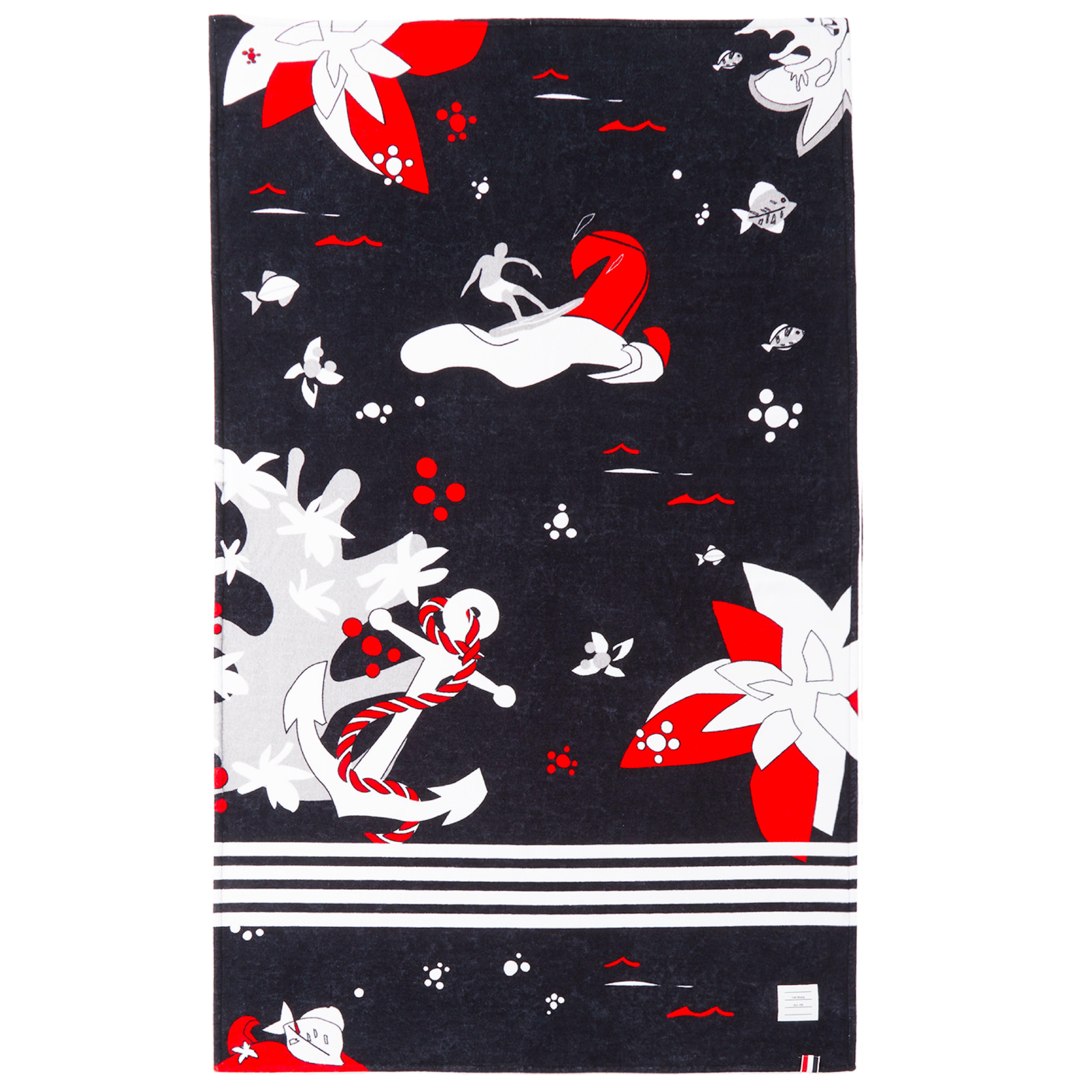 Thom Browne Navy and Red Hawaiian pattern beach towel. Rectangular cotton terrycloth towel in navy featuring graphic pattern in red, white, and grey throughout. Signature stripes in white at length. White textile logo patch and signature tricolor