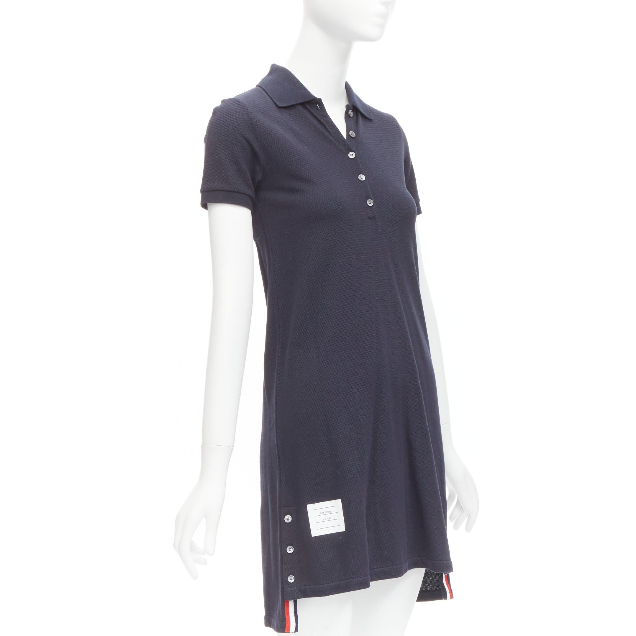 THOM BROWNE navy blue signature stripe webbing pique polo dress IT36 XXS
Reference: LNKO/A02214
Brand: Thom Browne
Designer: Thom Browne
Material: Cotton
Color: Navy
Pattern: Solid
Closure: Button
Extra Details: TB webbing detail at back.
Made in: