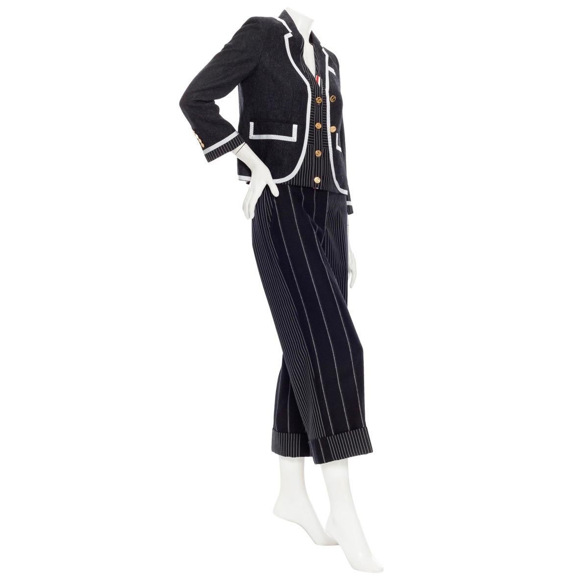 Thom Browne Navy Wool Pinstriped Jacket and Pants Suit

Includes suit jacket and pants
Navy/White
Pinstriped
Jacket features contrasting white grosgrain trim, a notched collar, two front patch pockets, a welt pocket, gold-tone anchor embossed