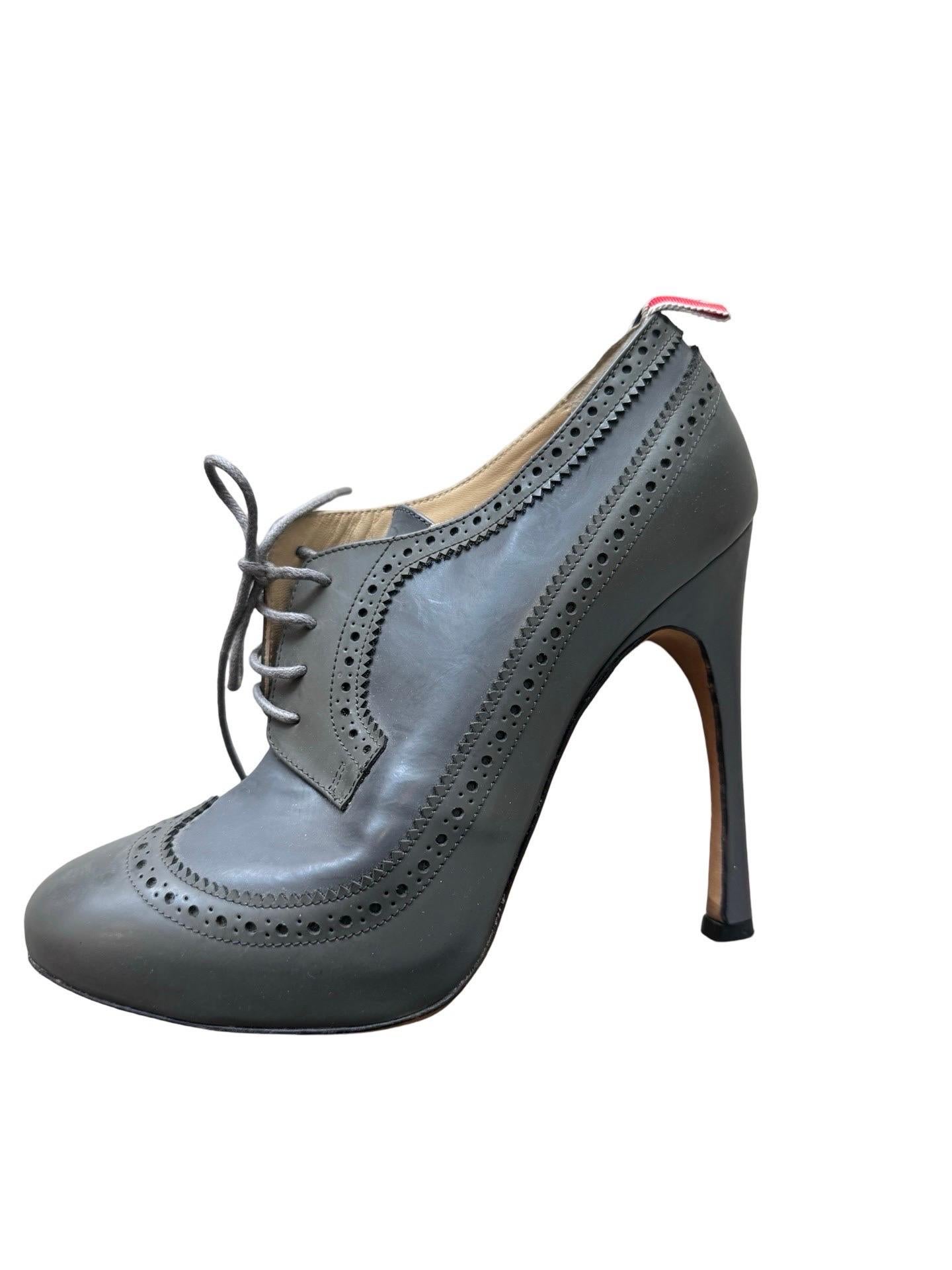 Women's Thom Browne heeled loafers in a dark grey color leather.  Extra high heel (5