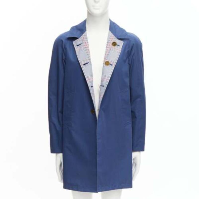 Thom Browne reversibile blu navy  cappotto classico a quadri con bottoni dorati JP2 M
Riferimento: JSLE/A00025
Marchio: Thom Browne
Designer: Thom Browne
Materiale: Cotone, misto
Colore: Marina, Multicolore
Modello: A scacchi
Chiusura: