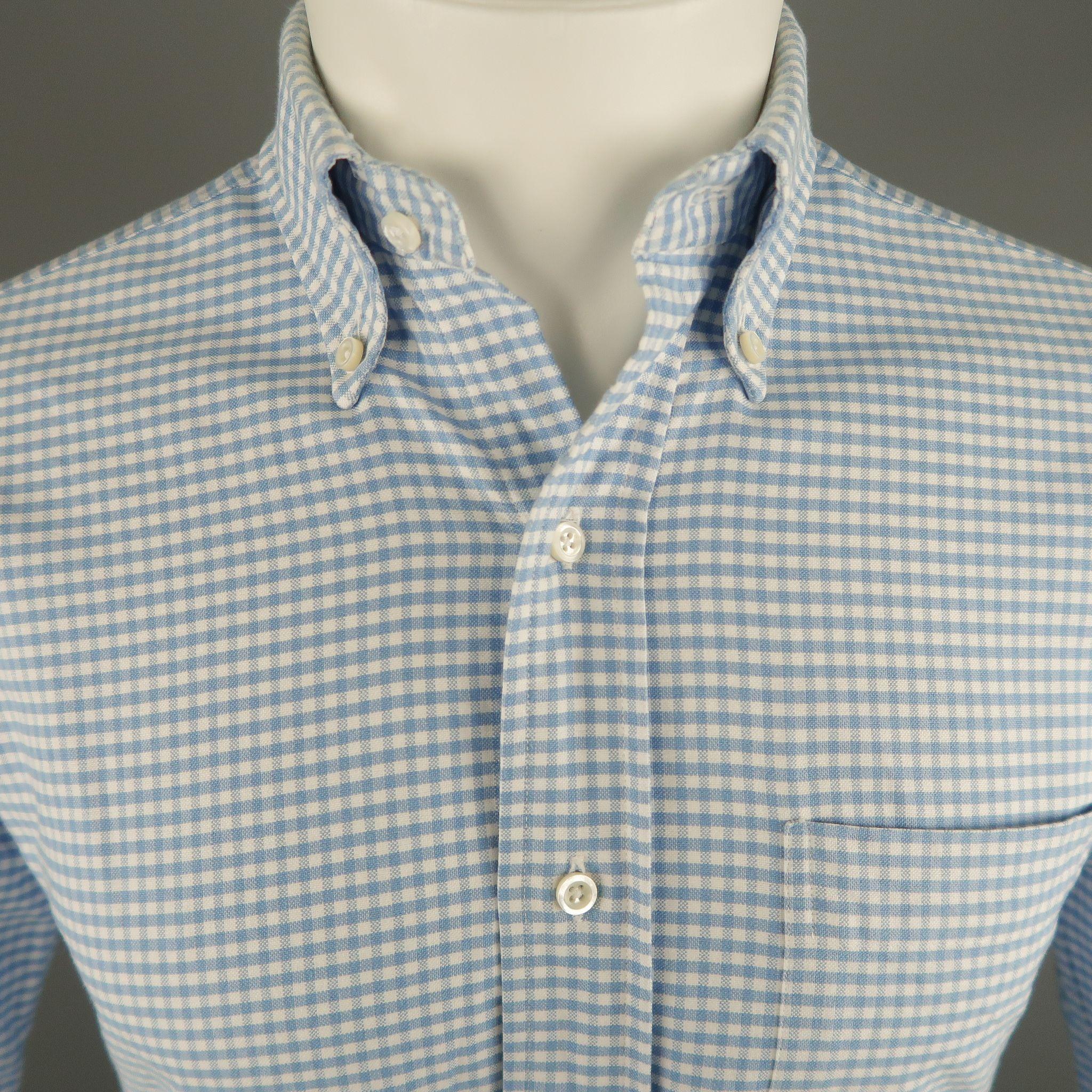 THOM BROWNE Long Sleeve Shirt comes in blue and white tones in a plaid cotton material, button down, with a front patch pocket and buttoned cuffs. Minor Wear at inner collar. Made in USA.

Excellent Pre-Owned Condition.
Marked: 1
 
Measurements:
