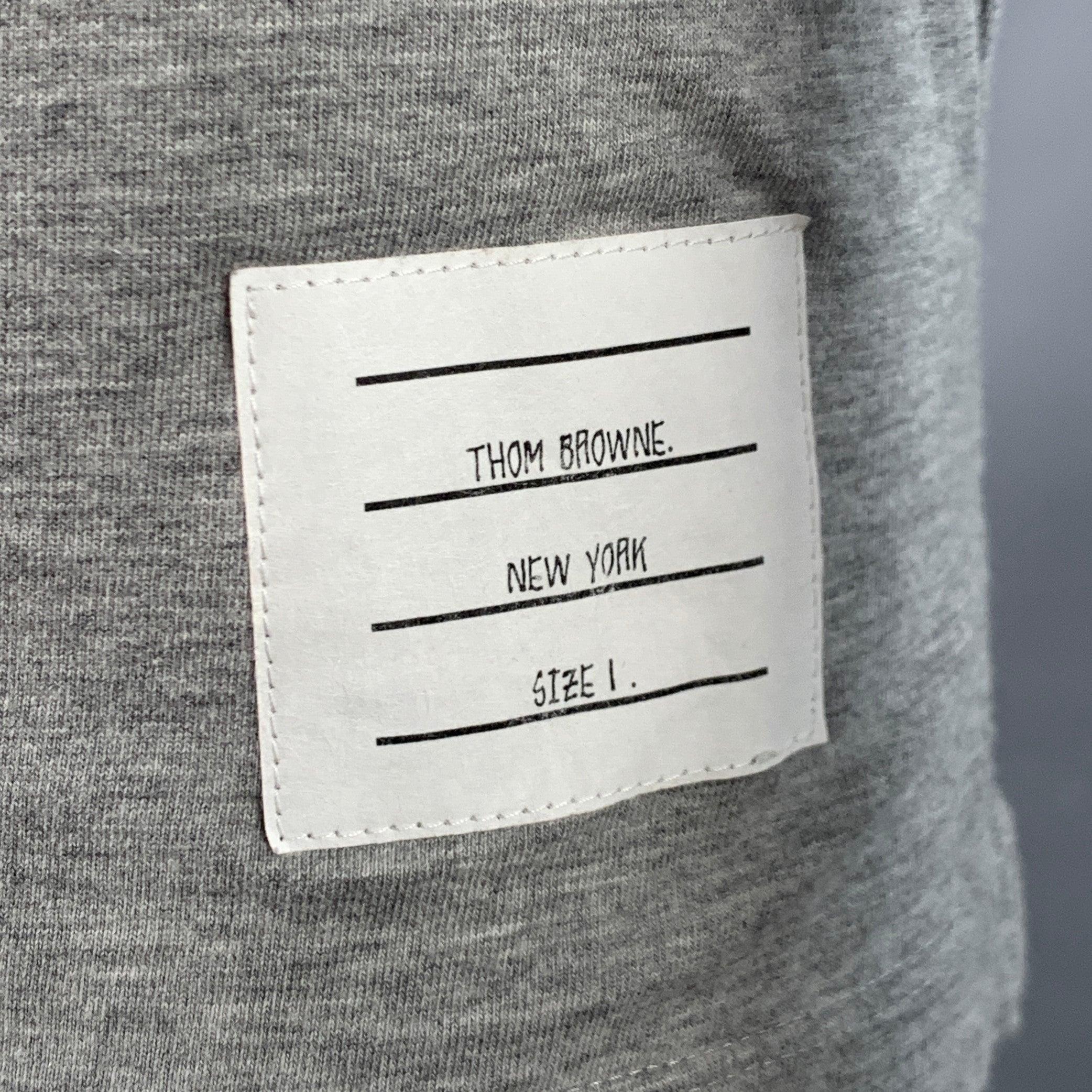 THOM BROWNE t-shirt
in a heather grey cotton jersey featuring long sleeves and crew neck. Made in Japan.Excellent Pre-Owned Condition. 

Marked:   1 

Measurements: 
 
Shoulder: 16 inches Chest: 38 inches Sleeve: 24.5 inches Length: 26 inches 
  
 
