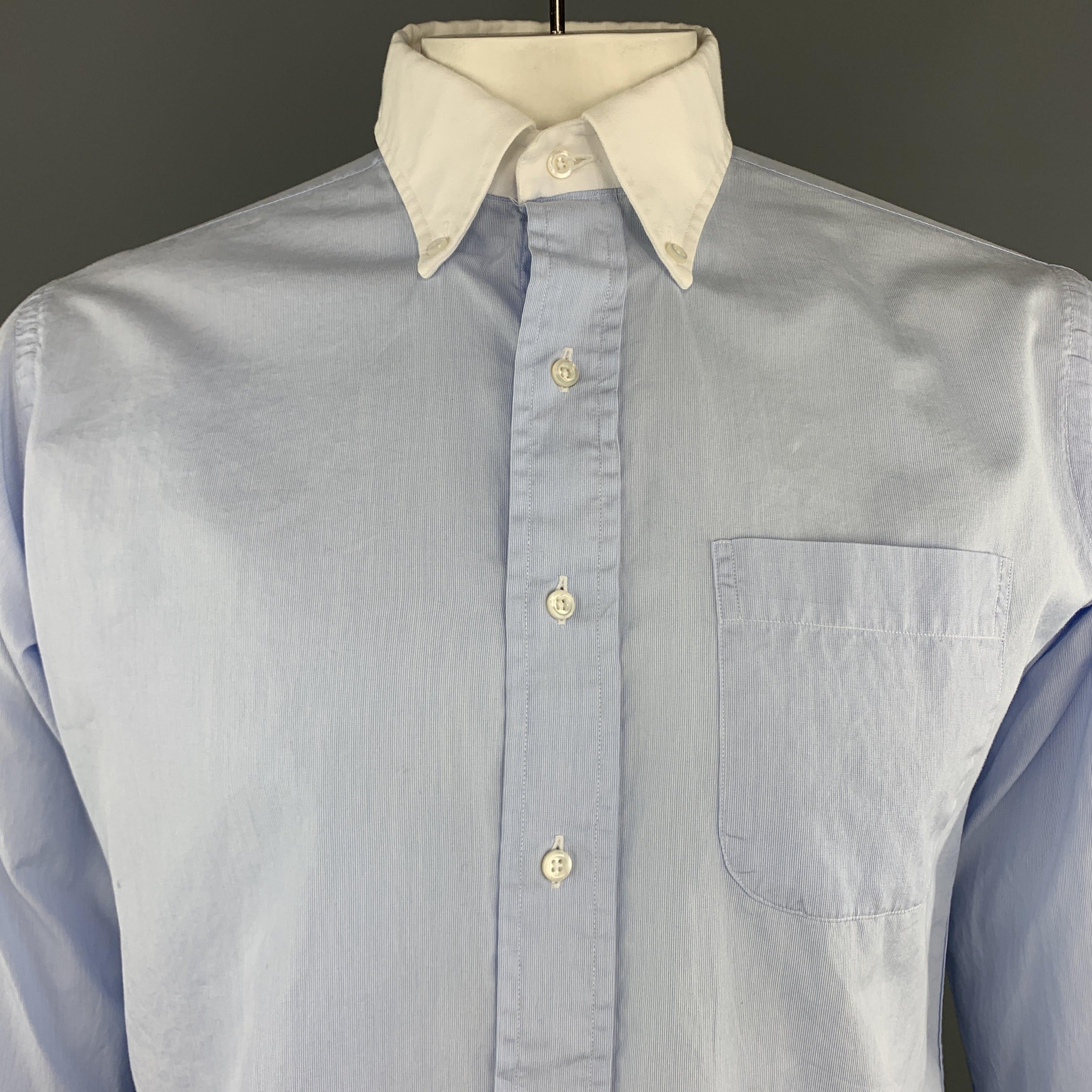 THOM BROWNE long sleeve shirt comes in a light blue cotton featuring a button down style, french cuffs, and a front patch pocket. Made in USA.
 
Excellent Pre-Owned Condition.
Marked: (No size)
 
Measurements:
 
Shoulder: 18 in.
Chest: 47