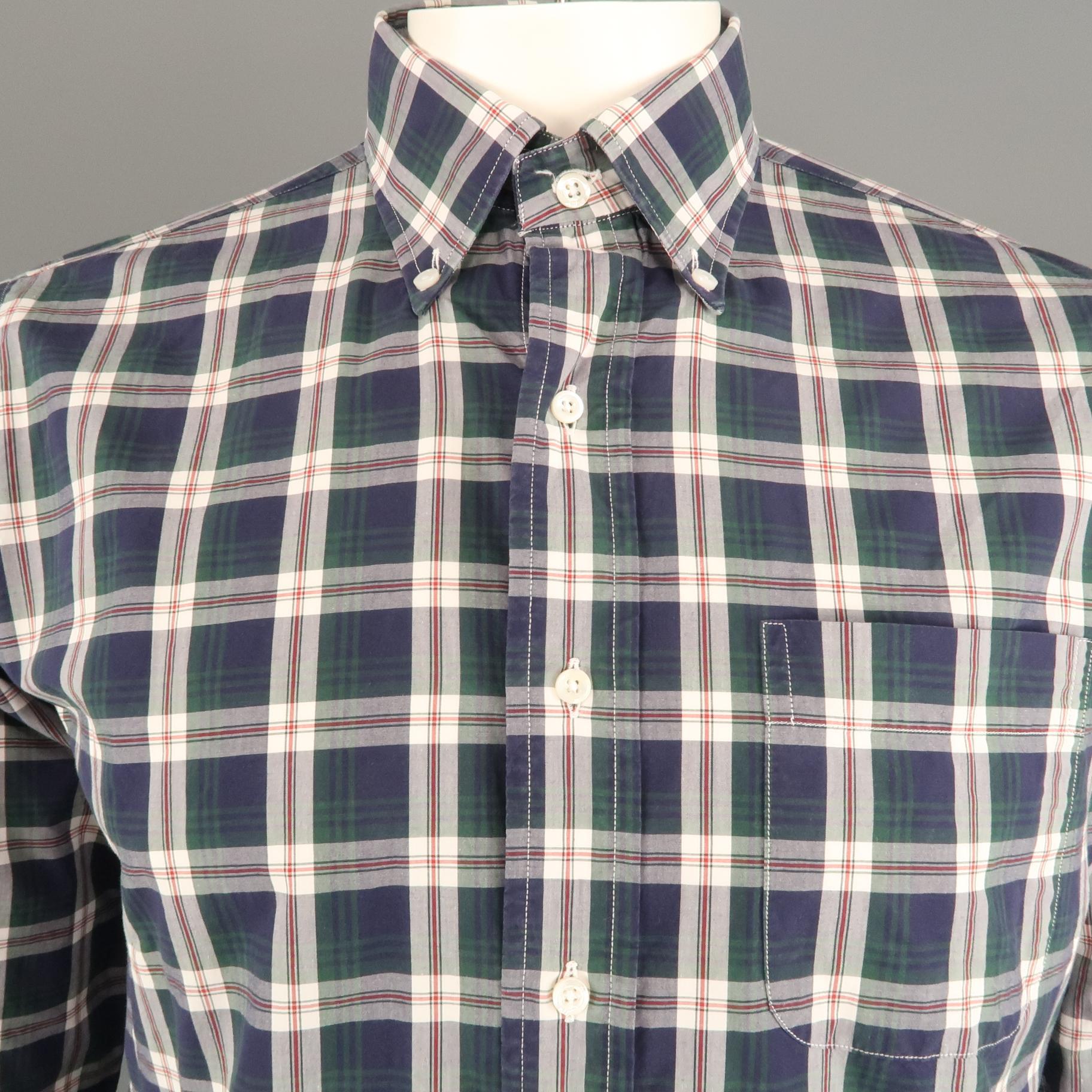 THOM BROWNE long sleeve shirt comes in a navy and green plaid cotton featuring a classic button down collar and a front patch pocket. Made in USA.
 
Excellent Pre-Owned Condition.
Marked: 4
 
Measurements:
 
Shoulder: 17.5 in.
Chest: 46 in.
Sleeve: