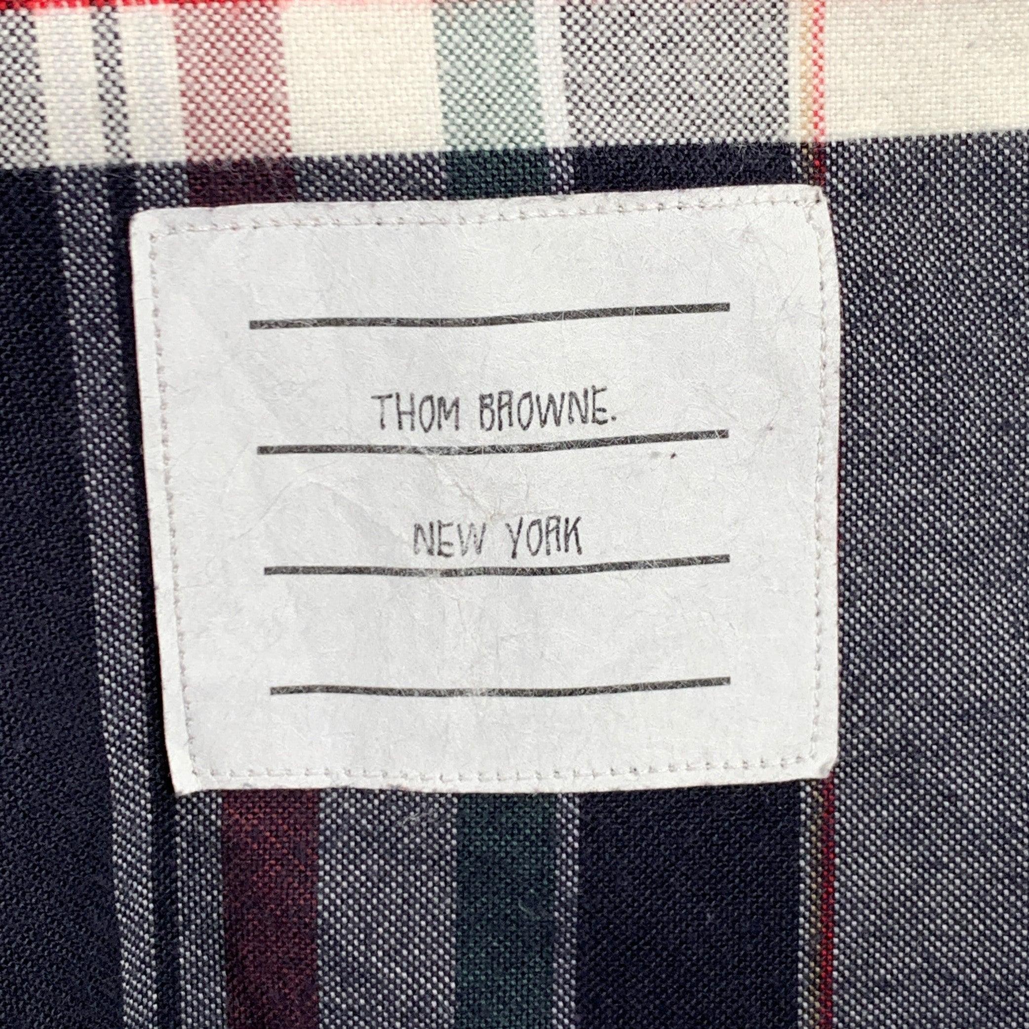 THOM BROWNE long sleeve shirt
in a
multi-color cotton woven fabric featuring a plaid pattern, button down collar, one pocket, and button closure. Excellent Pre-Owned Condition. No fabric or care tags. 

Marked:   size not marked. 

Measurements: 
