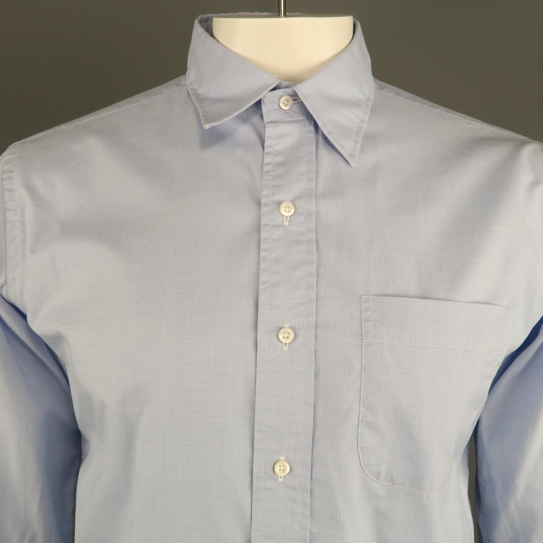 THOM BROWNE long sleeve shirt comes in a blue glenplaid cotton featuring a classic spread collar and a front patch pocket. Made in USA.
 
Excellent Pre-Owned Condition.
Marked: 5
 
Measurements:
 
Shoulder: 18 in.
Chest: 48 in.
Sleeve: 27