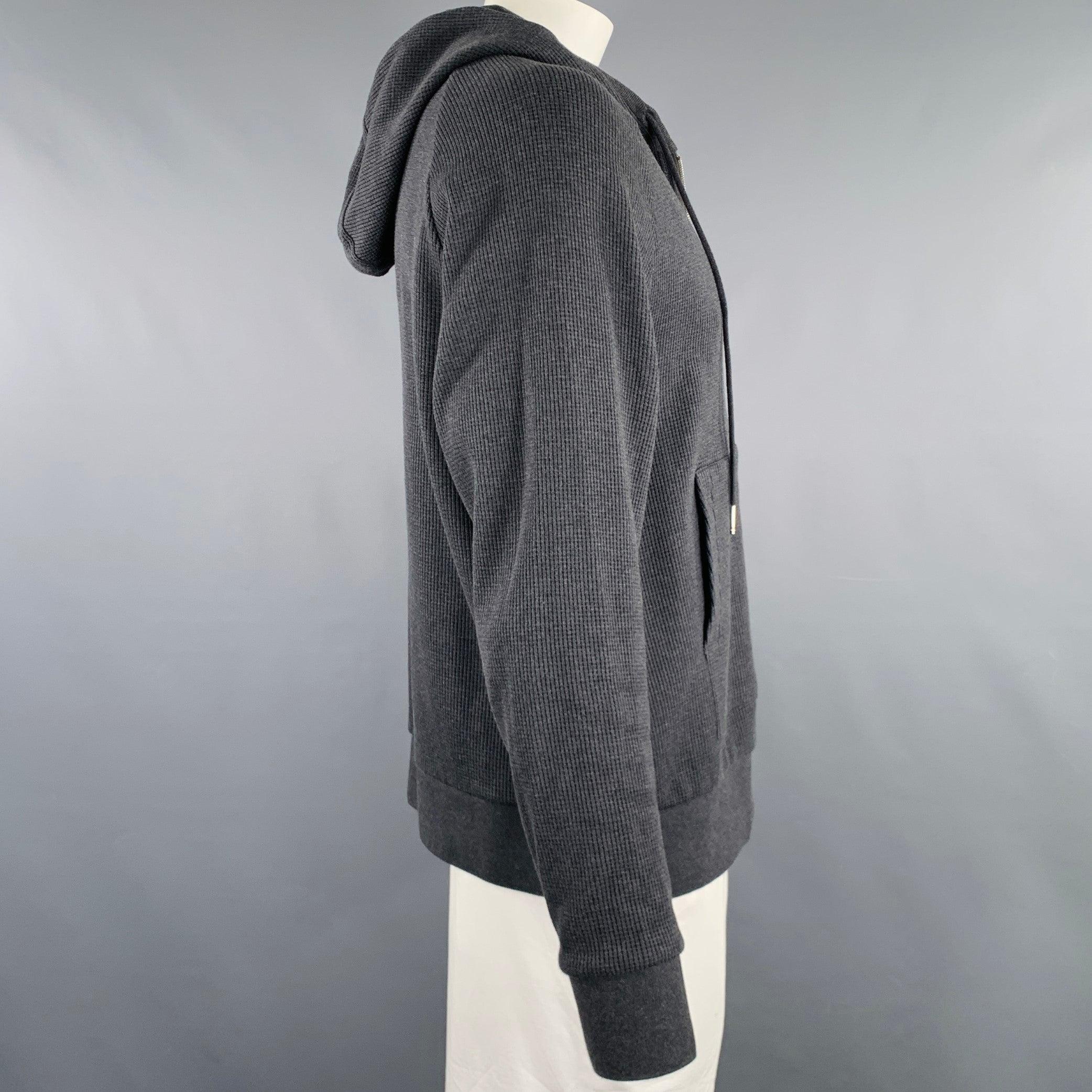 THOM BROWNE jacket
in a charcoal grey cotton knit featuring a raglan style, waffle knit design, contrasting light grey stripes, and zip up closure. Made in Italy. Excellent Pre-Owned Condition. 

Marked:   5 

Measurements: 
 
Shoulder: 16.5 inches