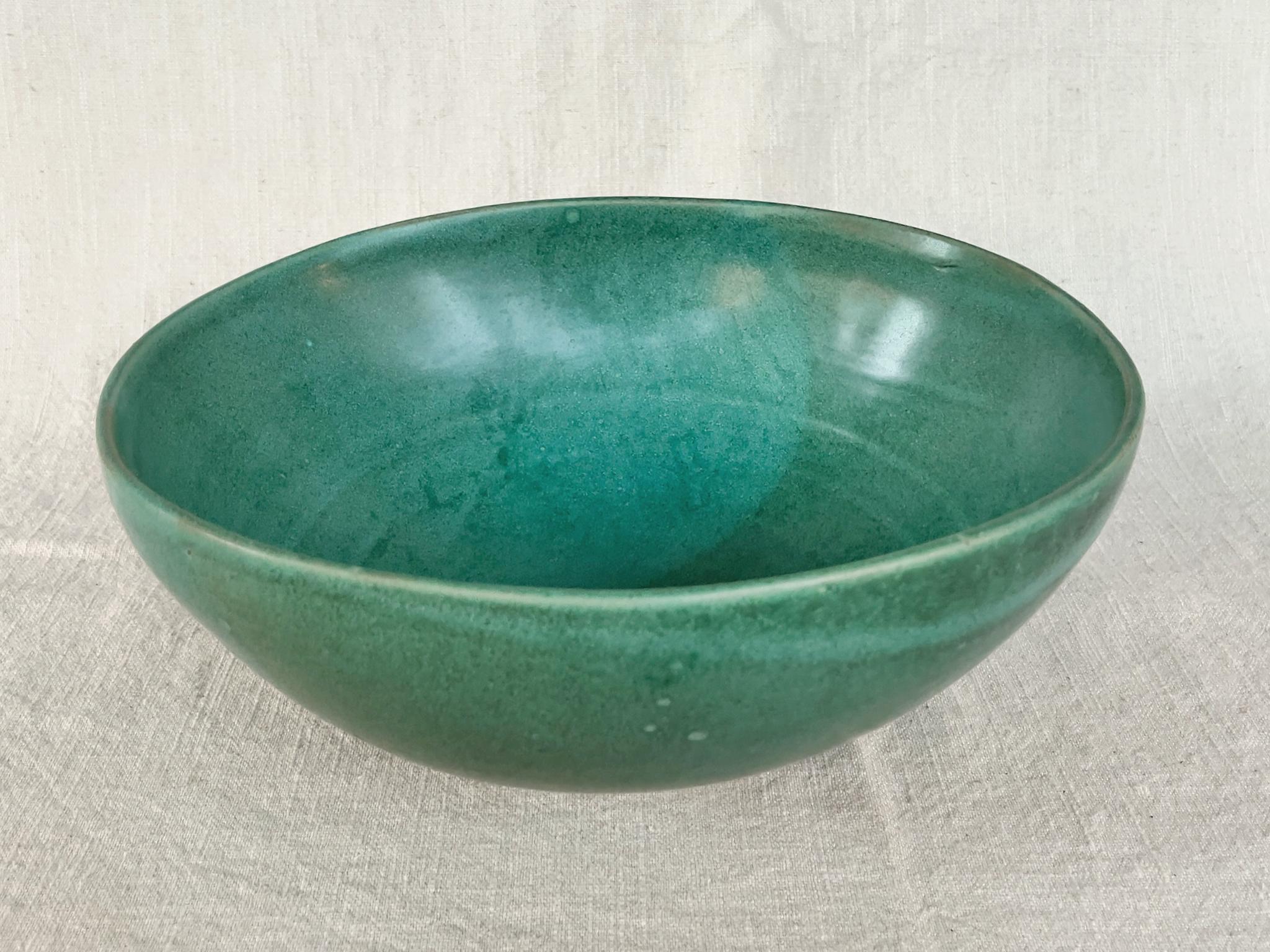 From Thom Lussier's Oxidized Copper Collection - a series of ceramic vessels that stand out for their brilliant palette and rich textures. This bowl is safe for food.

White stoneware with Cone 6 glaze.

Dimensions:
10.5 in. width
11.5 in.