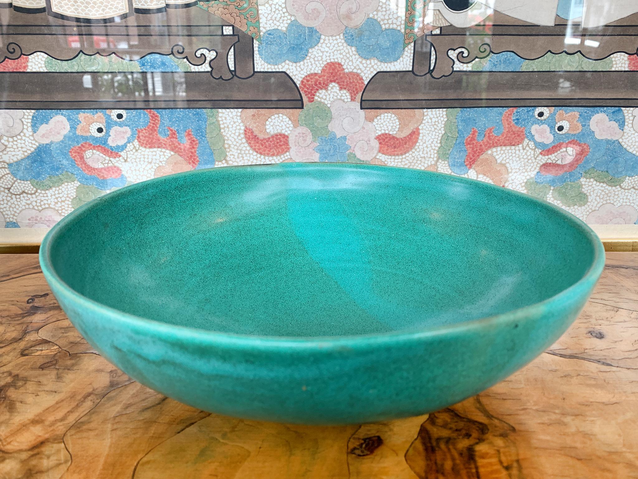From Thom Lussier's Oxidized Copper Collection - a series of ceramic vessels that stand out for their brilliant palette and rich textures. This bowl is safe for food.

White stoneware with Cone 6 glaze.

Dimensions:
11 in. diameter
3.75 in.