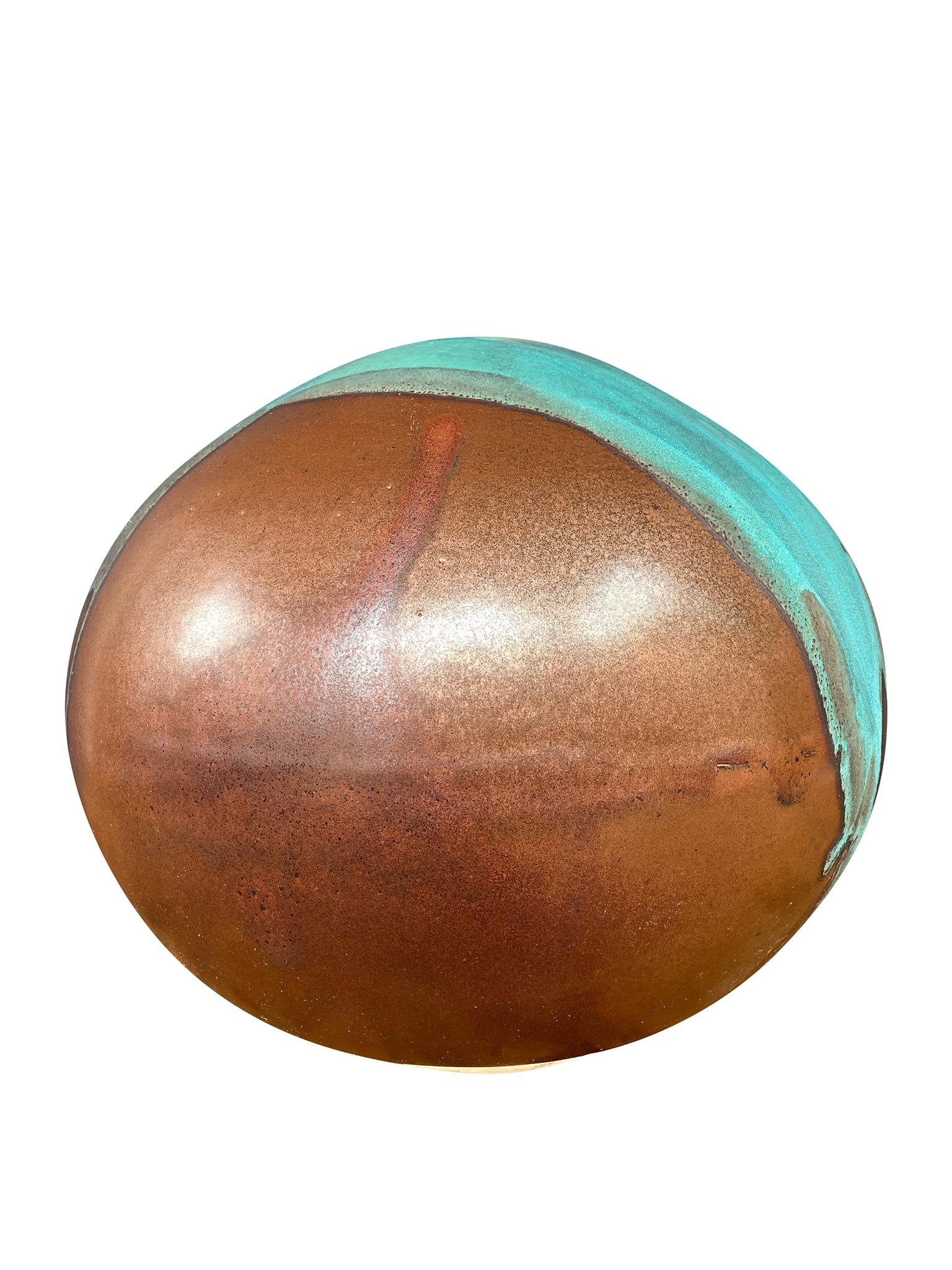 From Thom Lussier's Oxidized Copper Collection - a series of ceramic vessels that stand out for their rich textures and brilliant palette of copper and turquoise.

White stoneware, midfire glaze, cone 6.

Dimensions:
13 in. diameter
11.5 in.