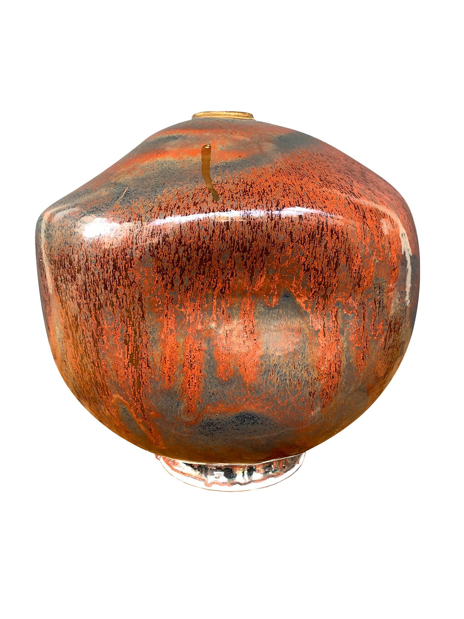 From Thom Lussier's Golden Patina Collection - a series of ceramic vessels with rich, colorful surfaces that evoke both terrestrial and otherworldly terrain. This vessel has a whimsical 