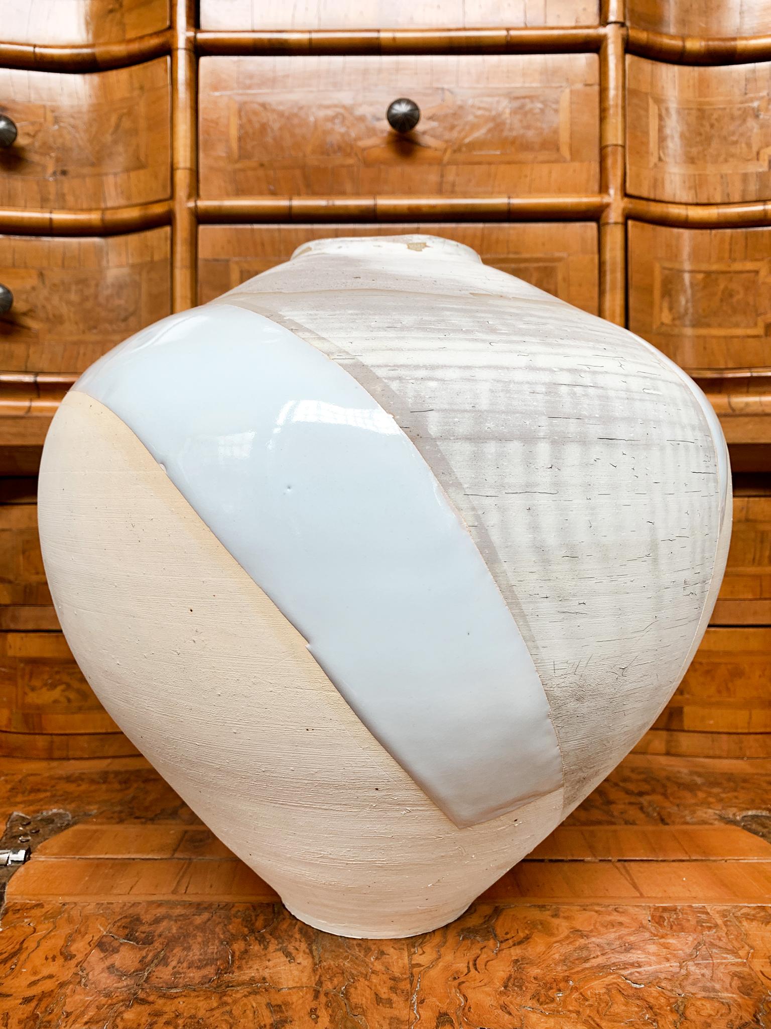 From a series of fashion-inspired ceramics by Thom Lussier, hand-crafted exclusively for Cafiero Select. Smooth glaze and matte, crackled finish create an evocative mix of textures and pastel hues composed like a couture, color-block dress!

White