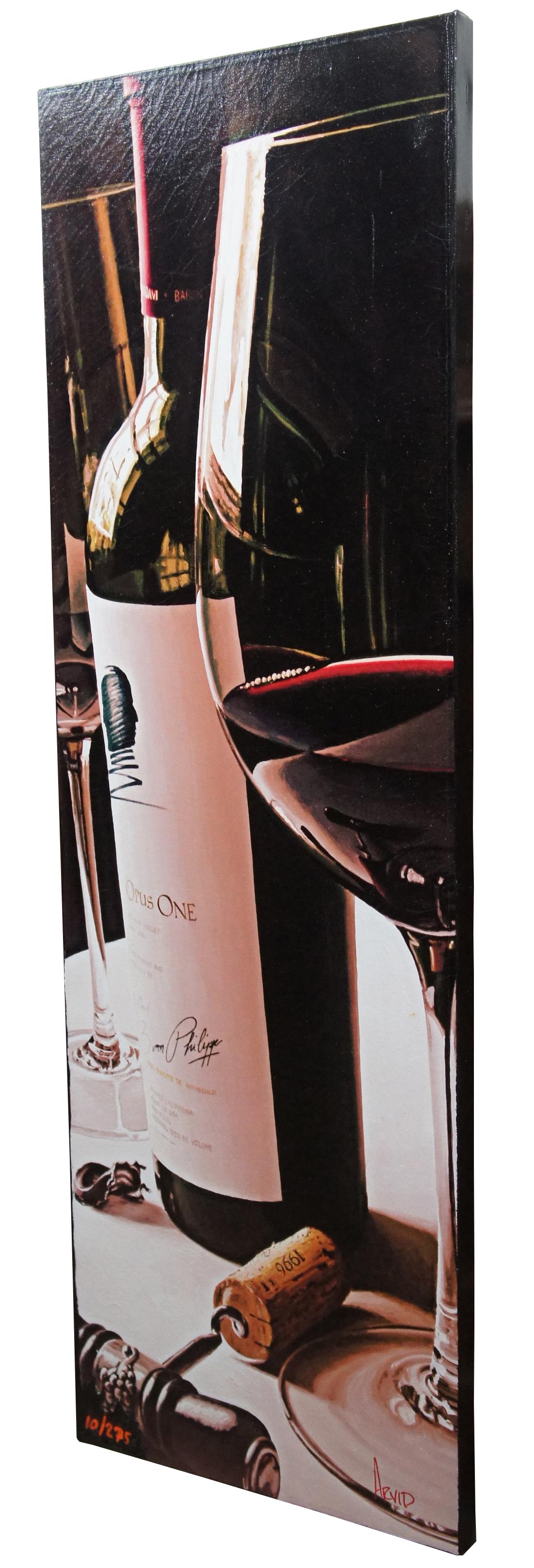 America’s Bordeaux by Thomas Arvid – Signed and numbered 10/275 giclee print on canvas; still life featuring a wine bottle, two glasses and a corkscrew. Thomas Arvid is known for his detailed paintings of oversized still life of wine and the rituals