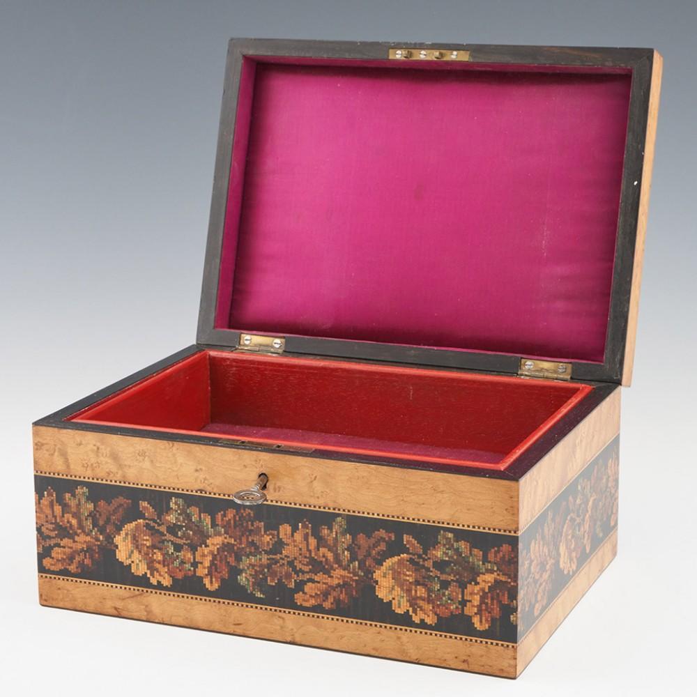 Heading : Thomas Barton Tunbridge ware jewellery box
Date : c1870
Period : Victoria
Origin : Tunbridge Wells, Kent
Decoration : Central rose mosaic. Border with OXO chainlink mosaic typical of Barton's work. Side panels with oak leaf banding within