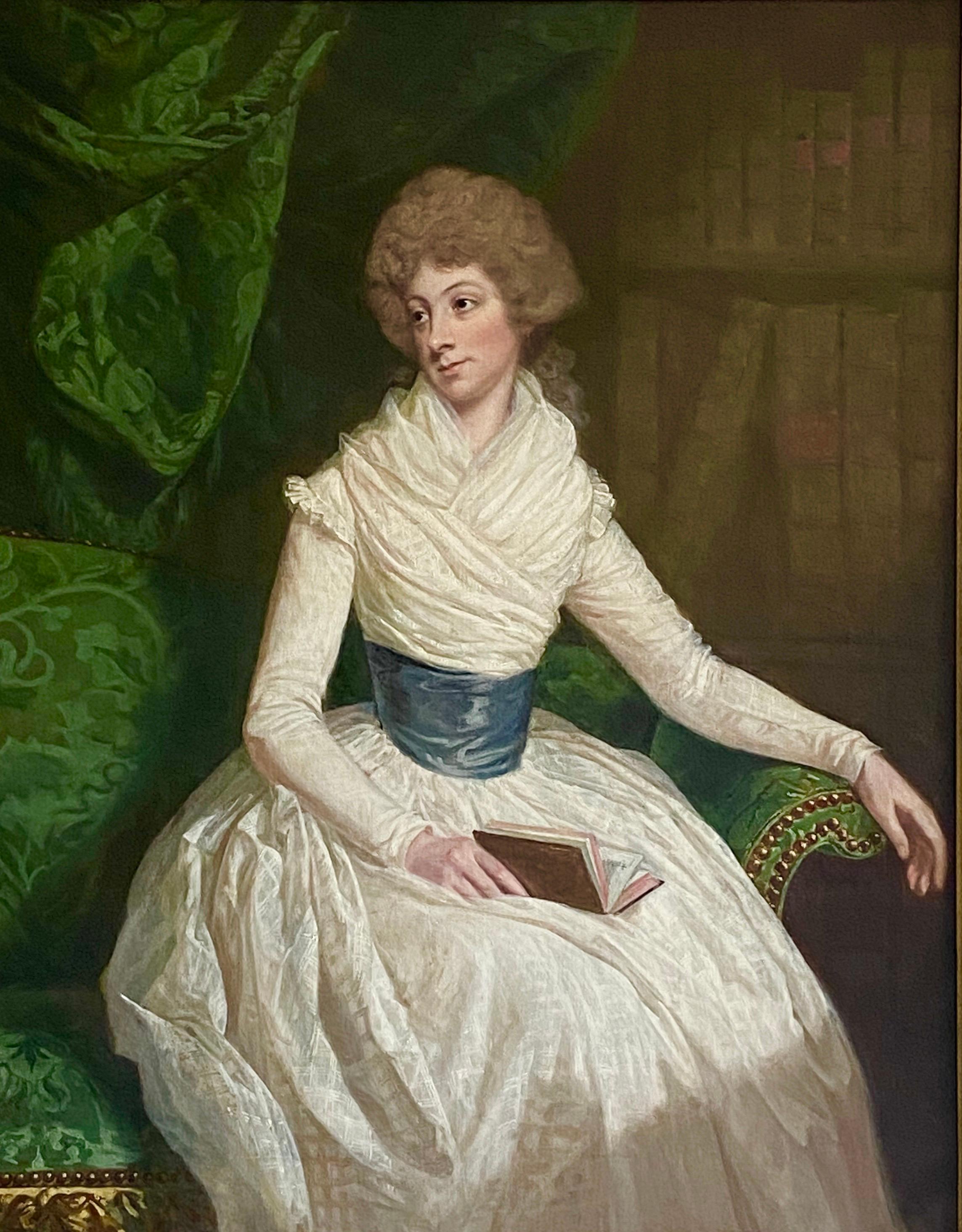 English 18th century Portrait of a Lady seated in a Library with a book - Painting by Thomas Beach