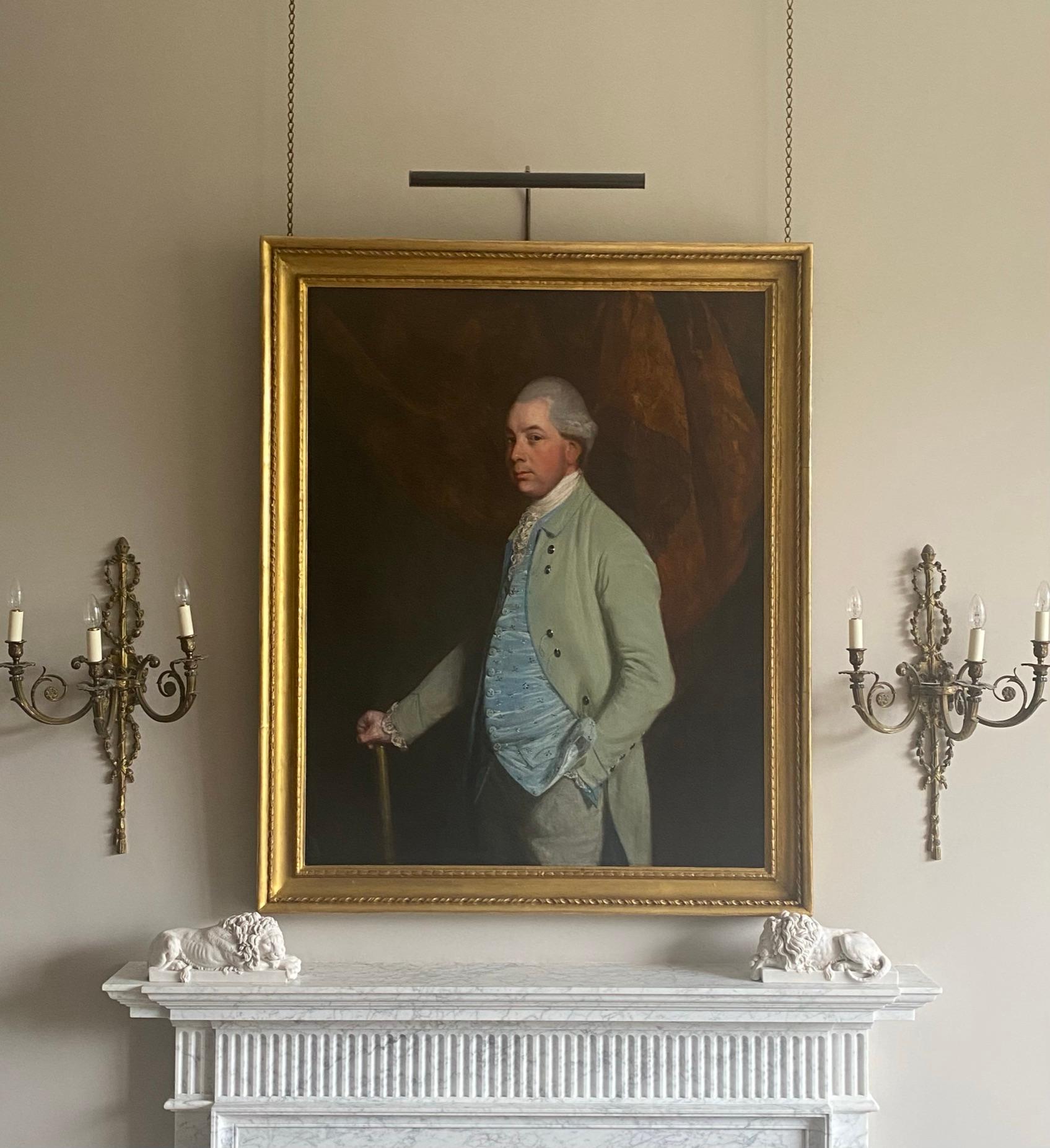 Portrait of William, Baron Craven wearing a green jacket in an interior - Black Portrait Painting by Thomas Beach