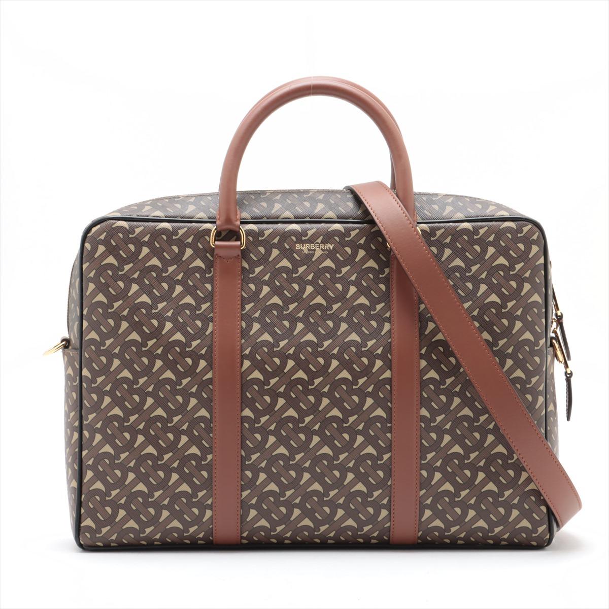 *ships around 11/11

The Thomas Burberry TB Monogram Two-Way Business Bag in brown is a sophisticated accessory designed for the modern professional. Featuring the iconic TB monogram pattern, the bag blends elegance with practicality. It includes