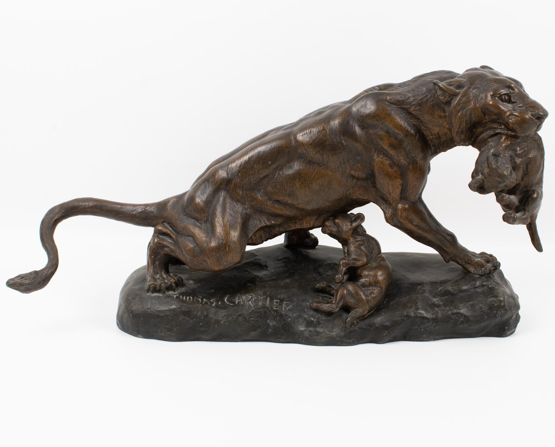Thomas François Cartier (1879-1943) designed this spectacular cast spelter sculpture during the Art Deco period in France in the 1920s. The artwork features a panther with two cubs. This artwork form is refined and powerful, showing the morphology