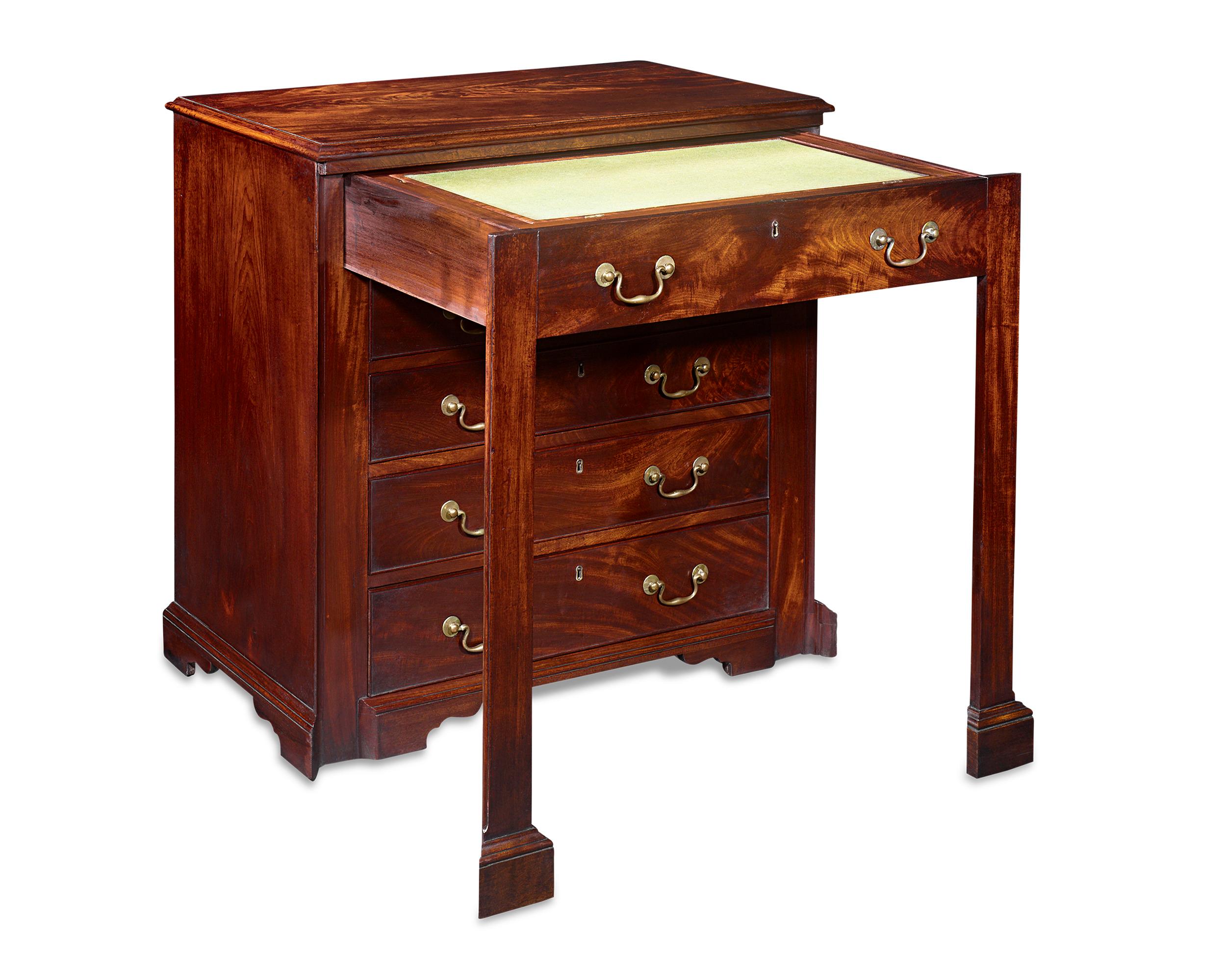 This magnificent George II writing chest was crafted by the legendary cabinetmaker Thomas Chippendale. A metamorphic table, the top drawer slides out to reveal a green felted writing station. The timber on this piece is the finest quality Cuban
