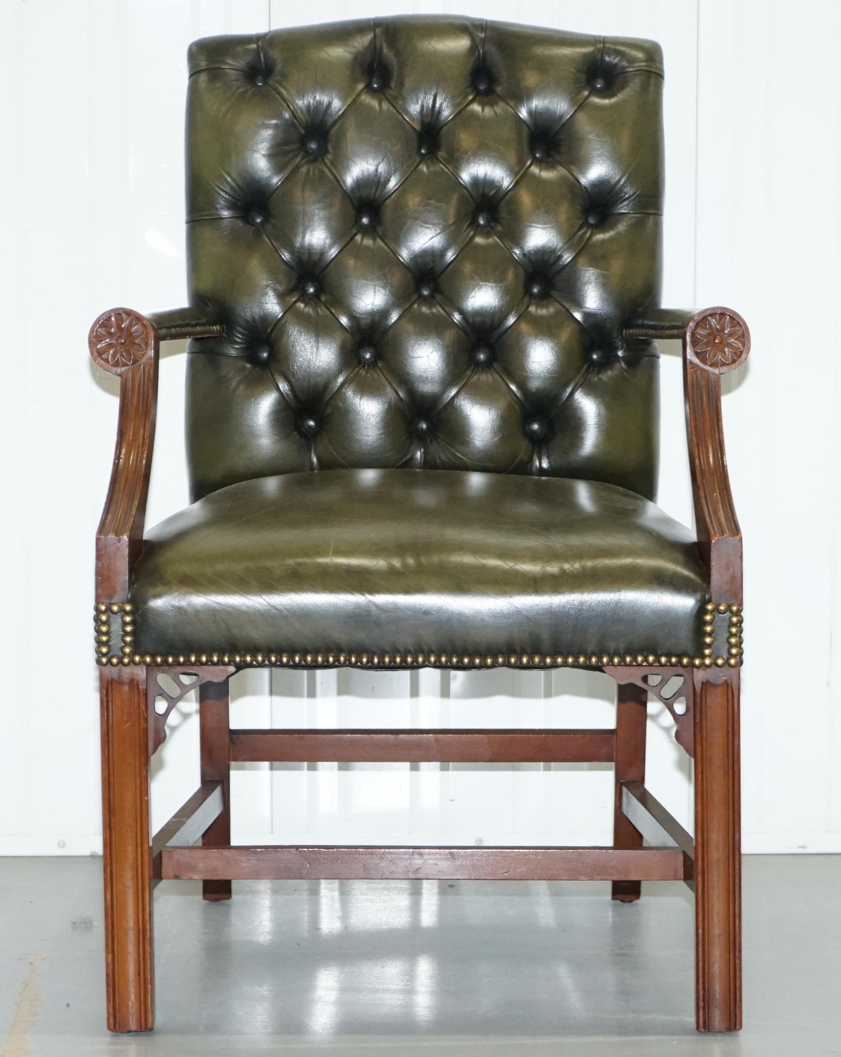 We are delighted to offer for sale this lovely aged green leather Chesterfield Gainsborough carver armchair with solid mahogany frames and fretwork carving in the manor of Thomas Chippendale 

A good looking and very comfortable chair, the frame