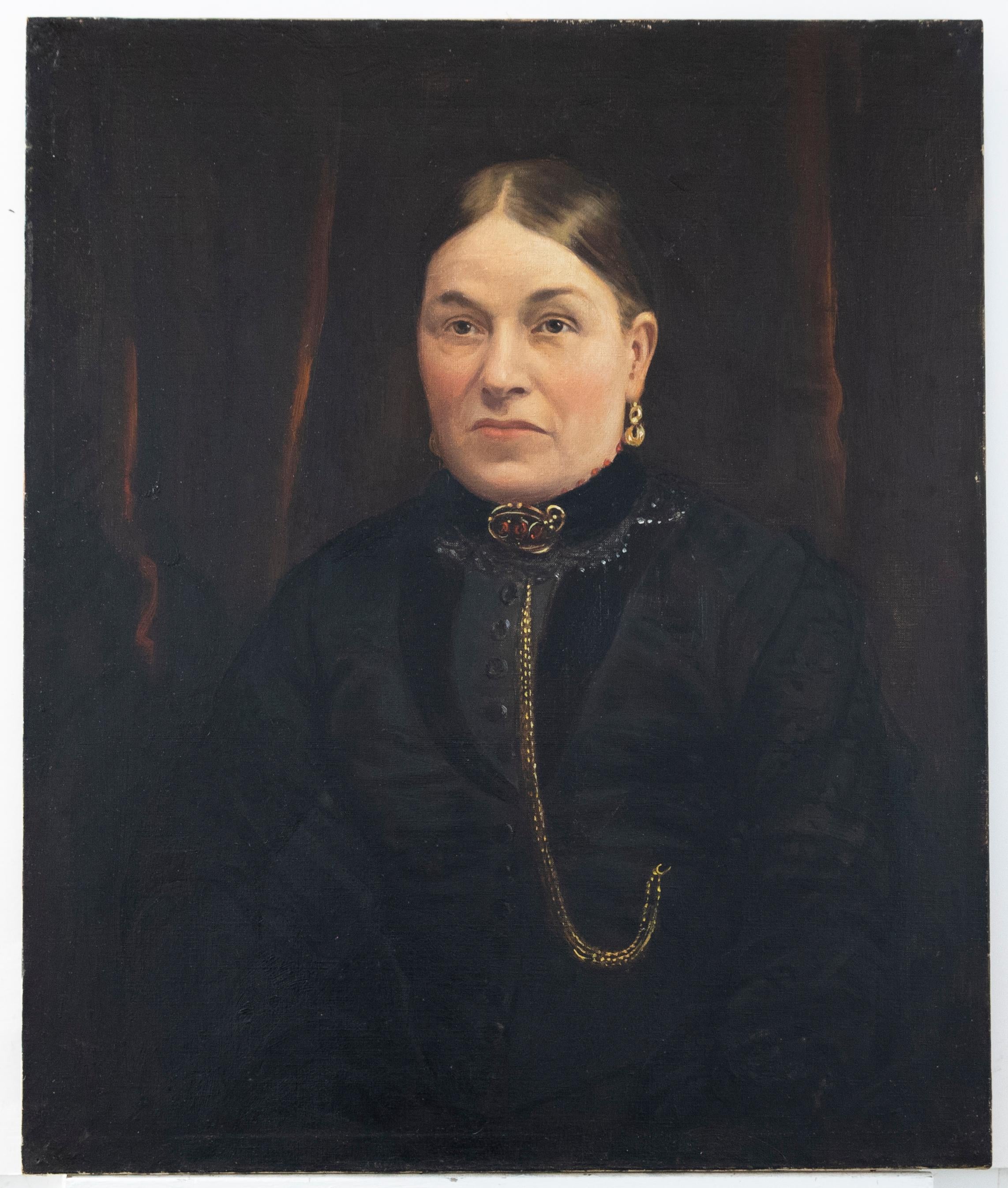 An impressive late Victorian portrait of a stern looking lady in mourning. The sitter wears an all black gown, buttoned down the front with a high lace collar. Pinned to the front of her outfit is a fine ruby and gold brooch, sitting proud with a