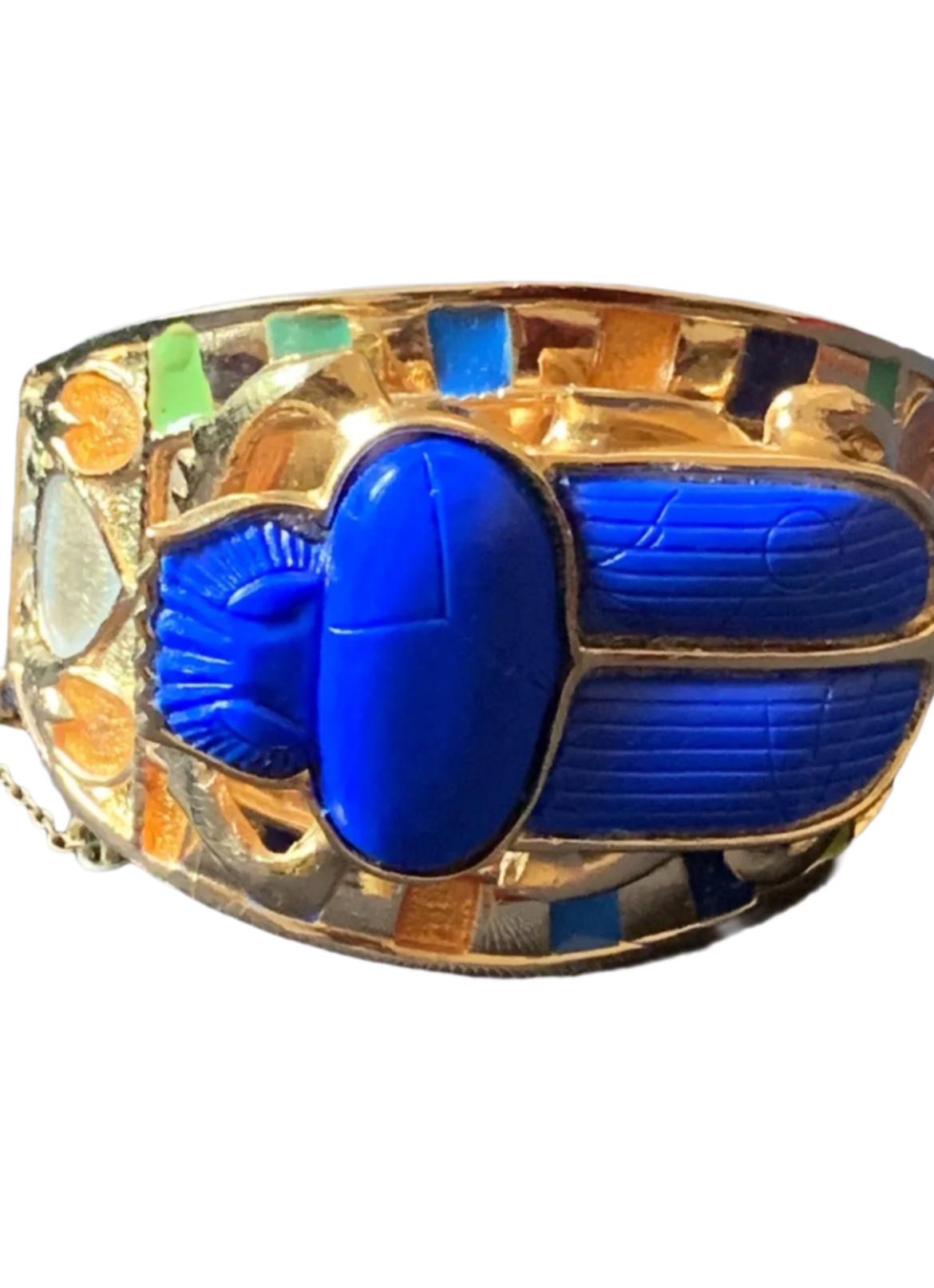 Spectacular Super Rare 1972 Thomas Fattorini Scarab bangle hinged bracelet.

This stunning cuff was part of a collection commission by the Times newspaper, originally sold at the British Museum London during the Tutankhamun exhibition in 1972. 

A