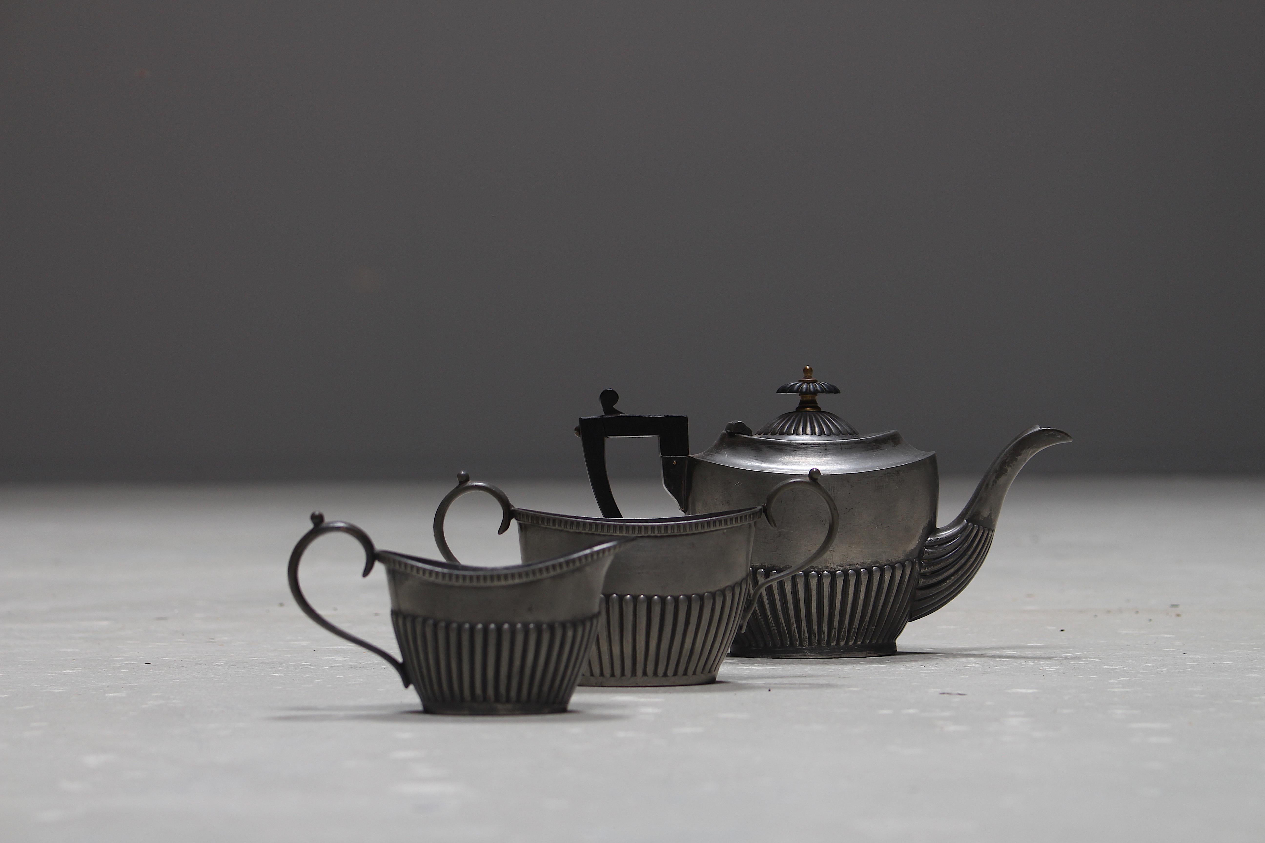 A lovely English three parts silver plated tea set by Thomas Henry Blake made in Sheffield, England.
In this tea set a teapot, a sugar bowl and a milk jug.
We did not polish the silver because we think this set has a beautiful patina.
All three