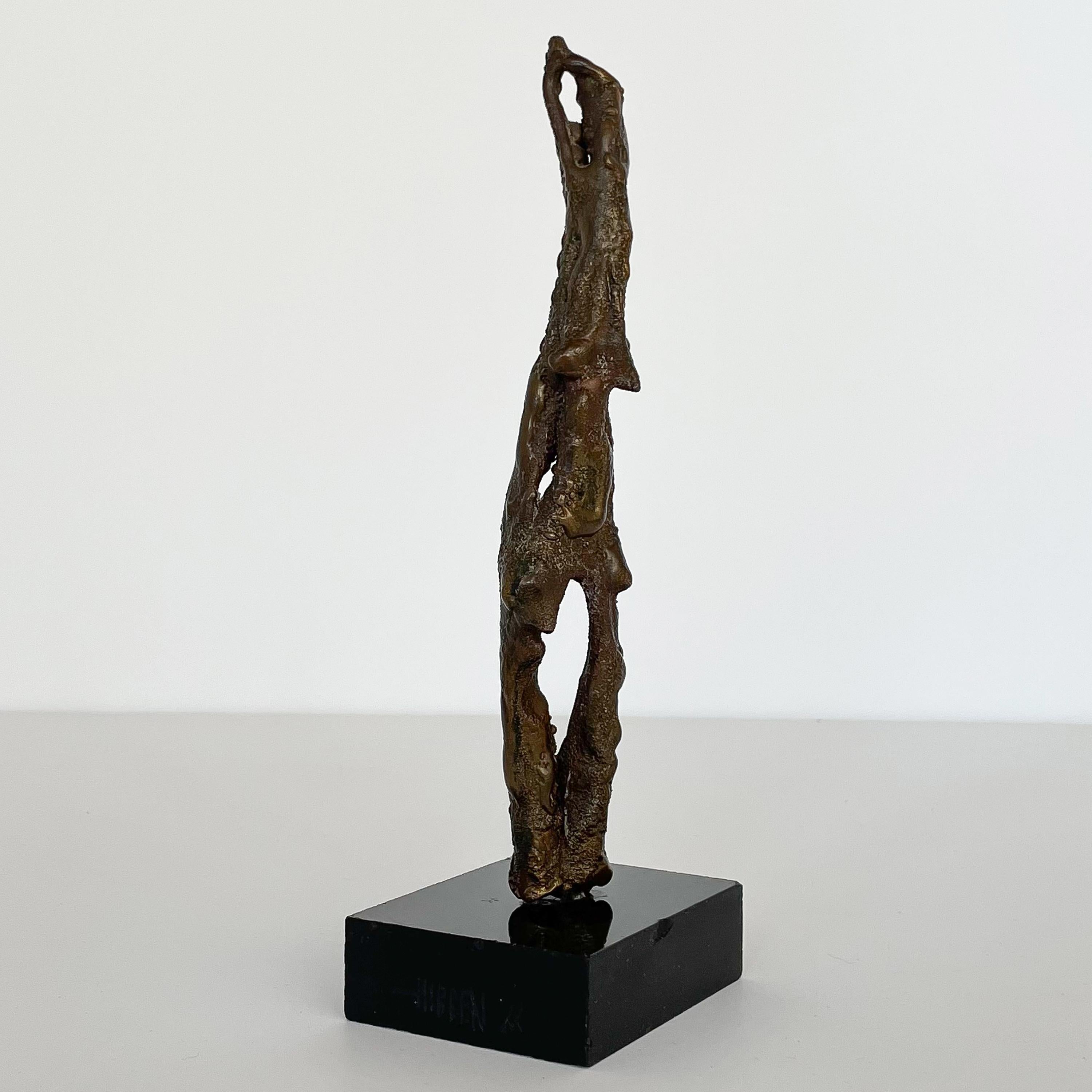 A petite Brutalist bronze sculpture by Chicago artist Thomas Hibben, circa 1966. Abstract textured bronze sculpture mounted on black base. Signed / inscribed on the front of the base 